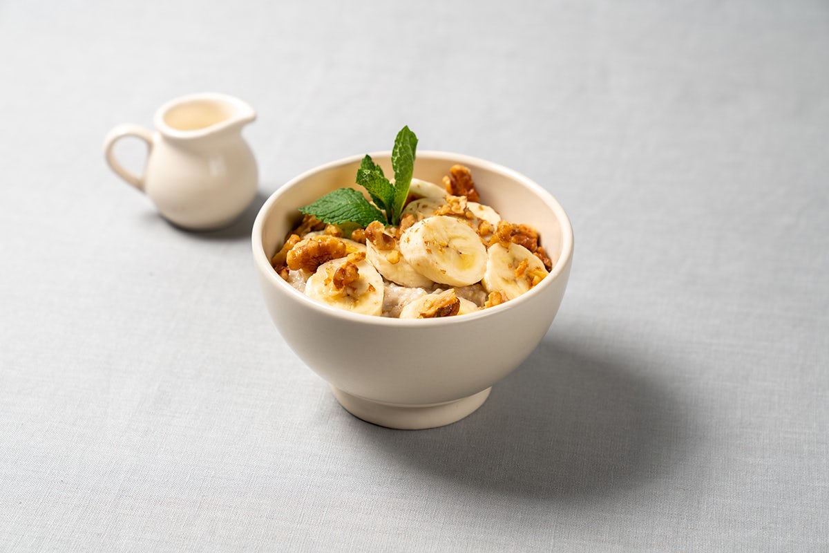 Order Organic Steel-Cut Oatmeal with Honey Walnuts and Banana food online from Le Pain Quotidien store, Studio City on bringmethat.com