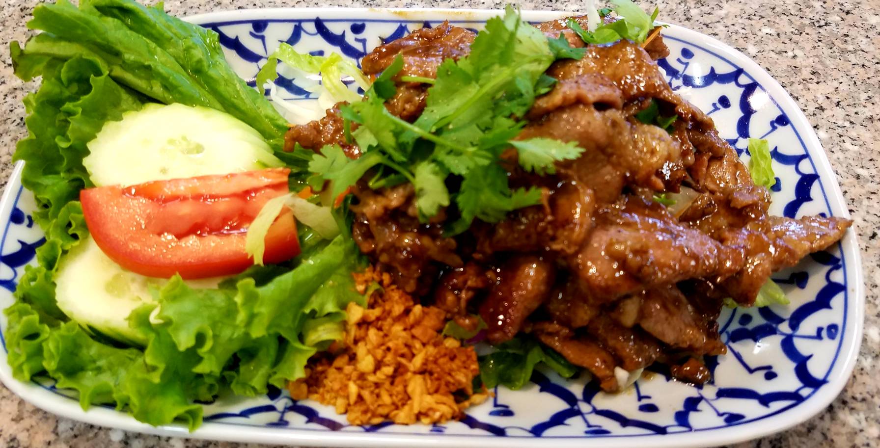 Order 39. Pad Kra Thiam Phrik Thai food online from Sizzling Wok store, Long Beach on bringmethat.com