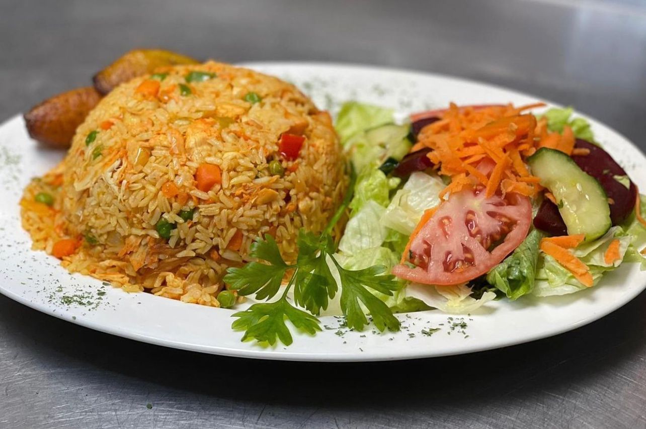 Order Arroz con Pollo Mixto / Rice With Chicken  food online from Mr. Mario store, College Point on bringmethat.com