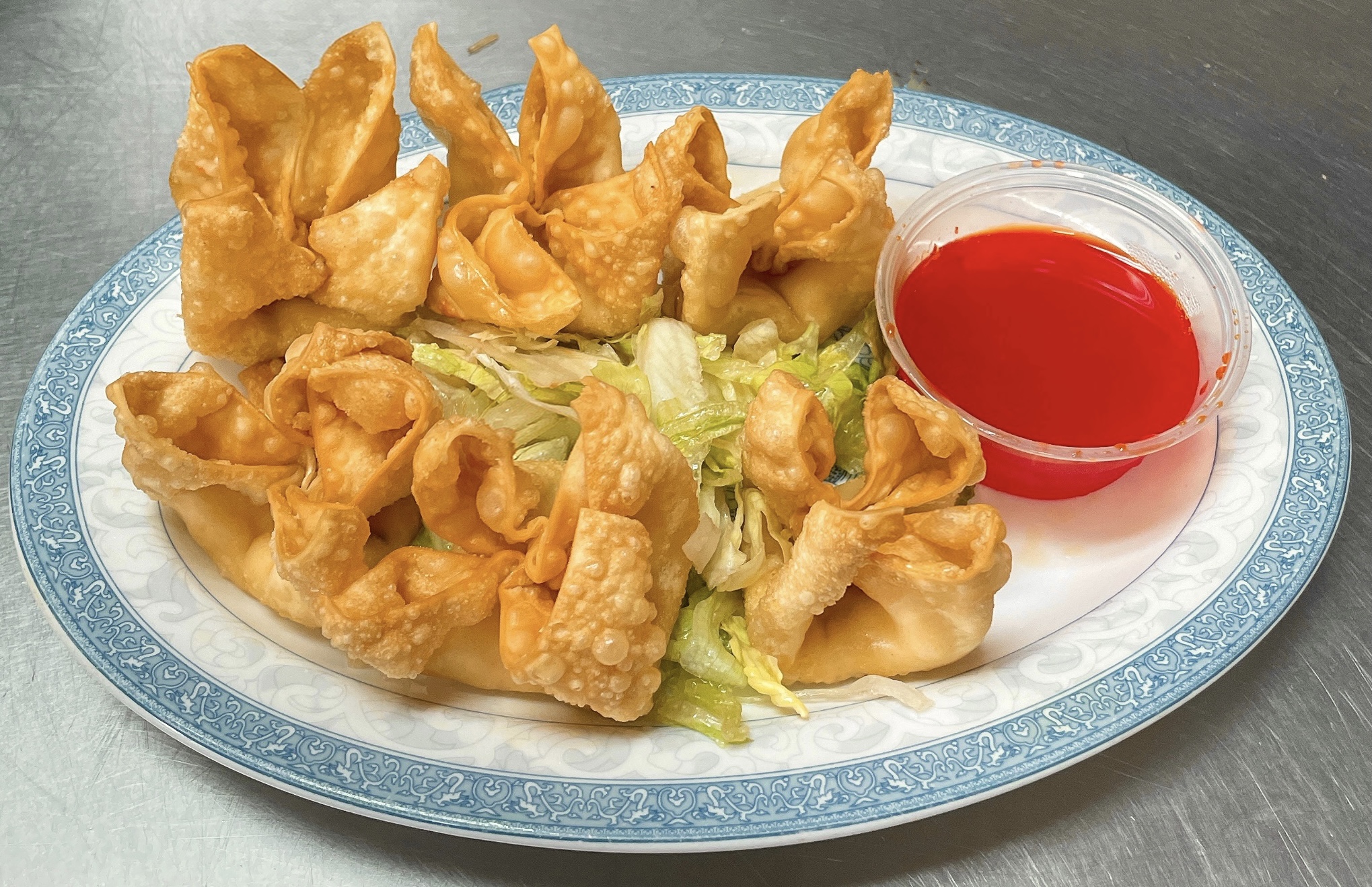 Order A4. Crab Rangoon food online from China Cottage store, Katy on bringmethat.com