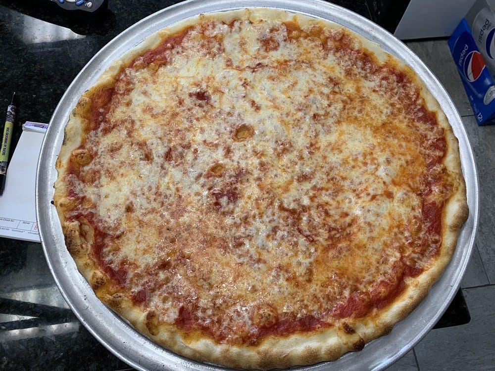 Order Regular Pizza - Medium 12'' food online from Vincenzos Pizzeria store, East Meadow on bringmethat.com