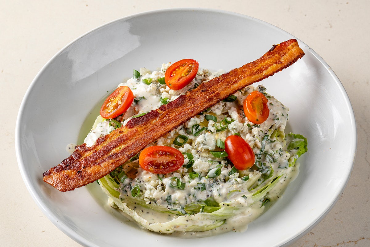 Order Signature Wedge Salad | GF food online from Perry's Steakhouse & Grille store, Raleigh on bringmethat.com