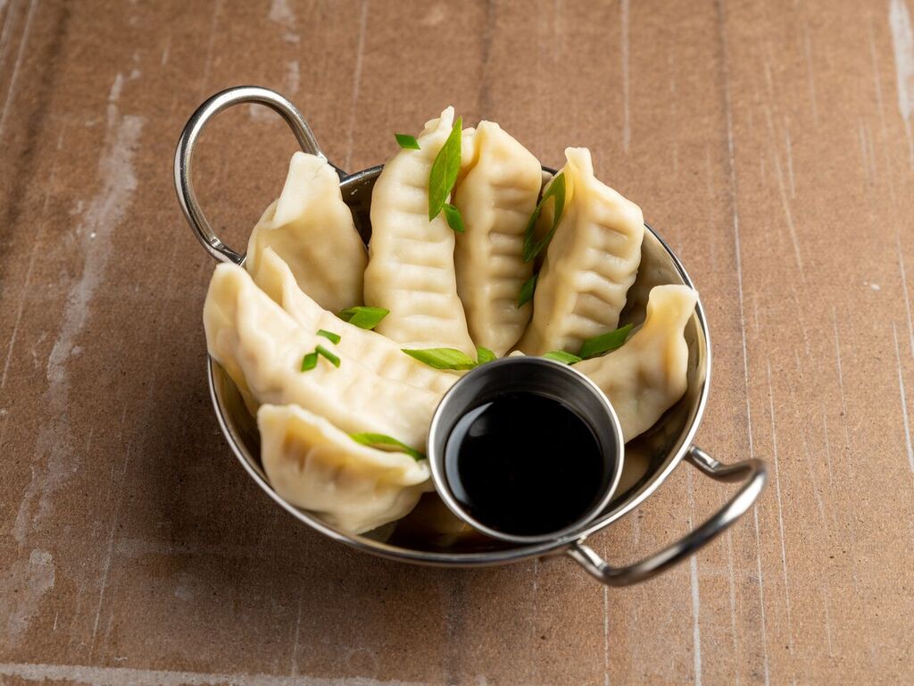 Order 8. Steamed Pork Dumplings food online from A8 China store, Madison on bringmethat.com
