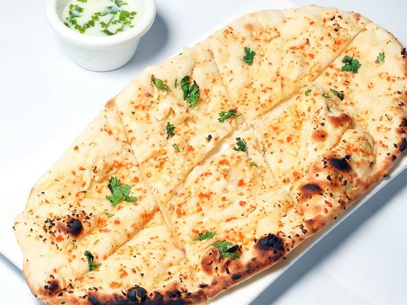 Order BUTTER GARLIC NAAN food online from Naan-Tastic store, Amherst on bringmethat.com