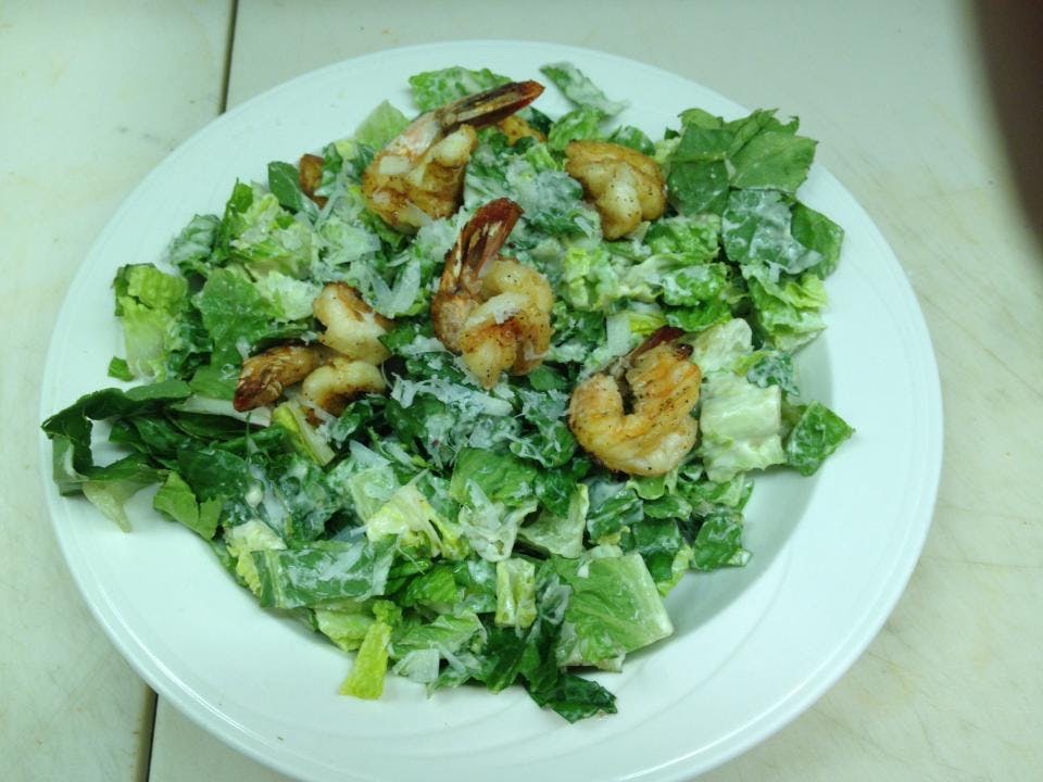 Order Caesar Salad with Grilled Shrimp - Large food online from Sinapi Pizzeria store, Brewster on bringmethat.com