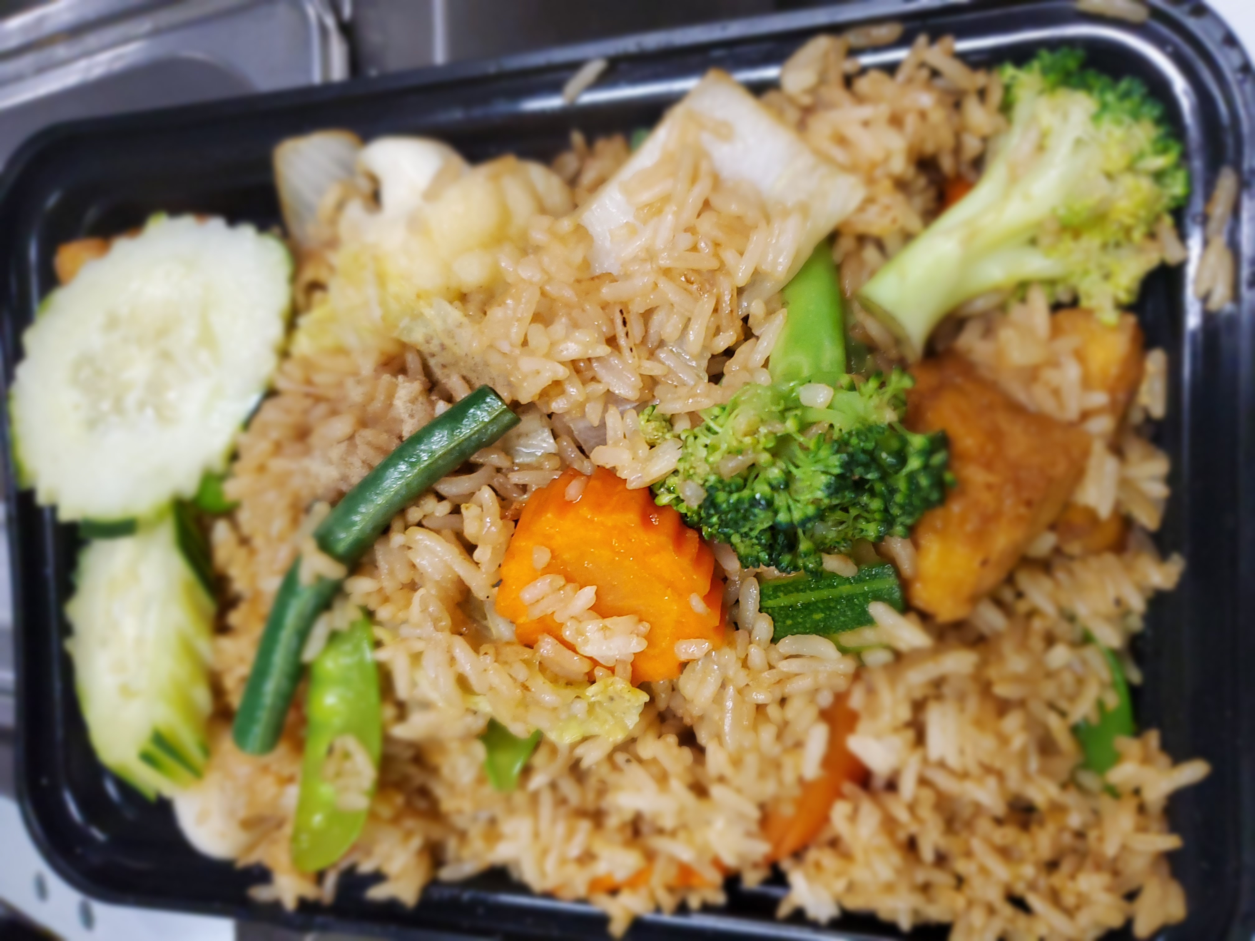 Order Veggies Fried Rice  food online from Pick Thai To Go store, Crofton on bringmethat.com