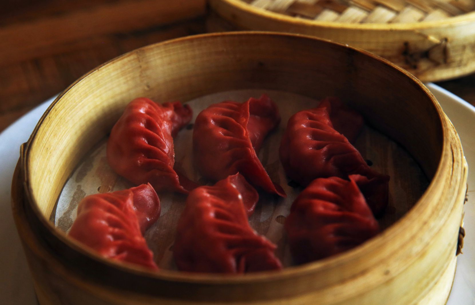 Order C9. Three Delicacy Dumplings food online from Dragon House store, Southlake on bringmethat.com