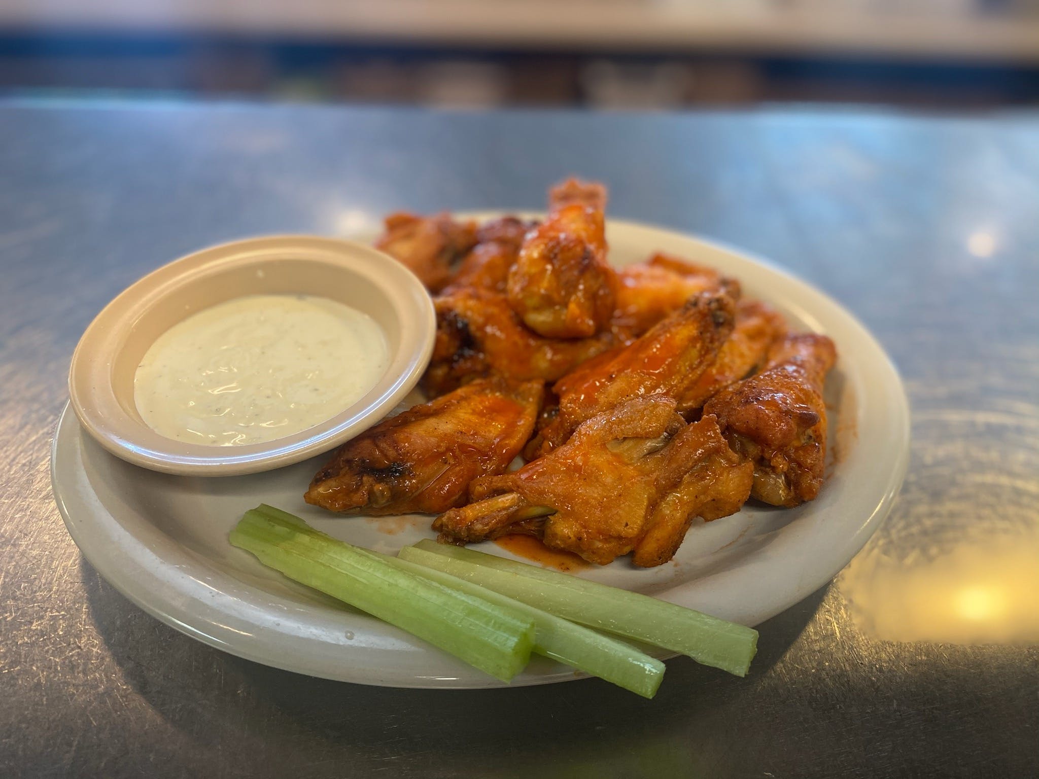 Order Regular Wings - 10 Pieces food online from Luca Italian Restaurant store, South Hill on bringmethat.com