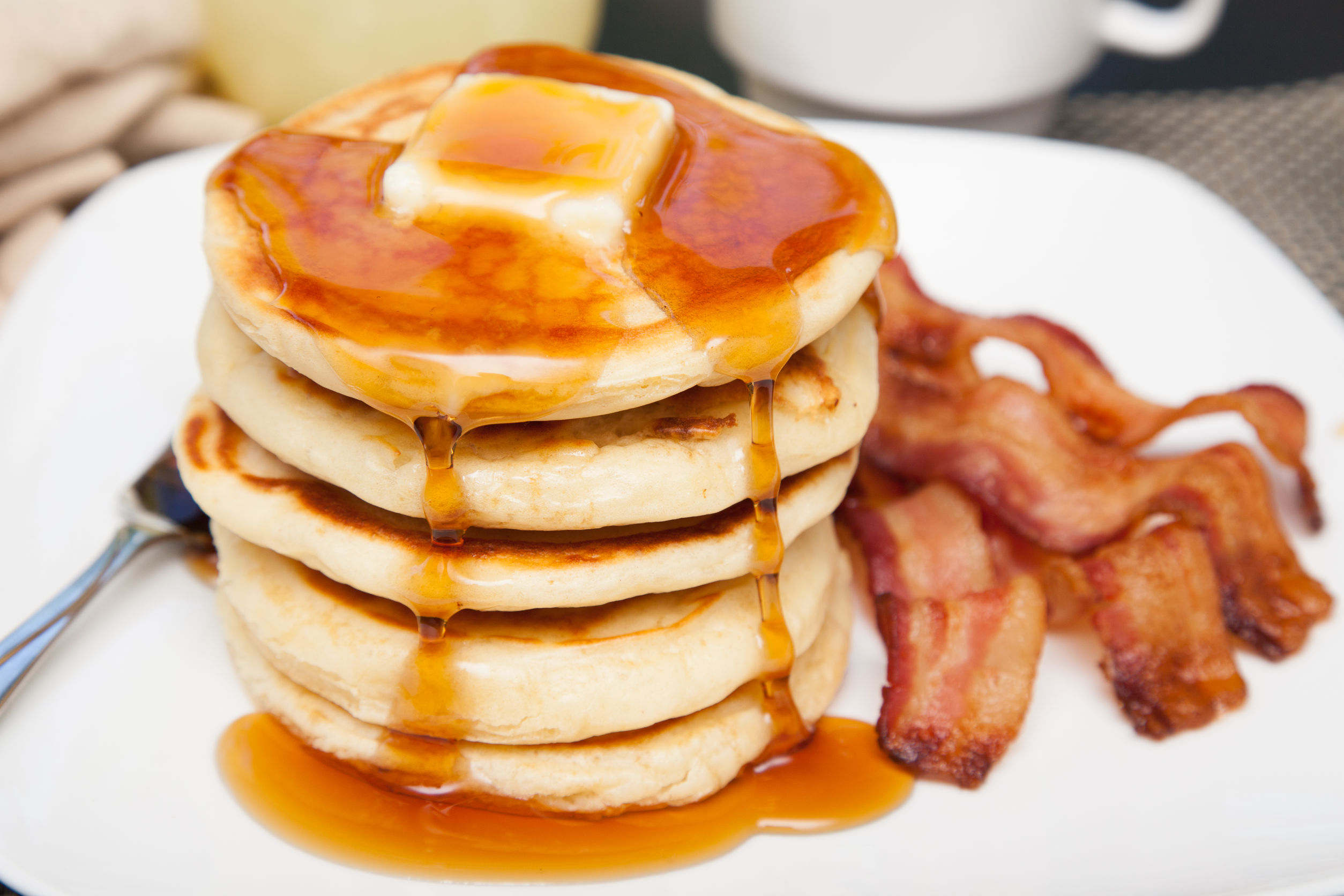Order Buttermilk Pancakes food online from Tozt Cafe store, New York on bringmethat.com