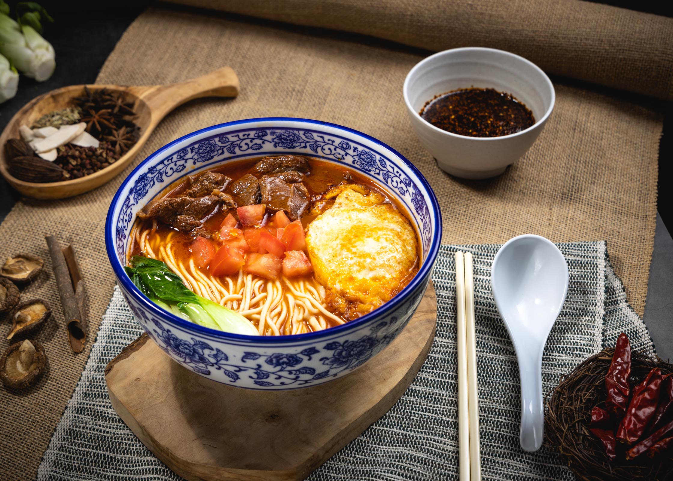 Order F5. Tomato Beef Noodle Soup with Pan Fried Egg food online from Northern Cafe store, Irvine on bringmethat.com
