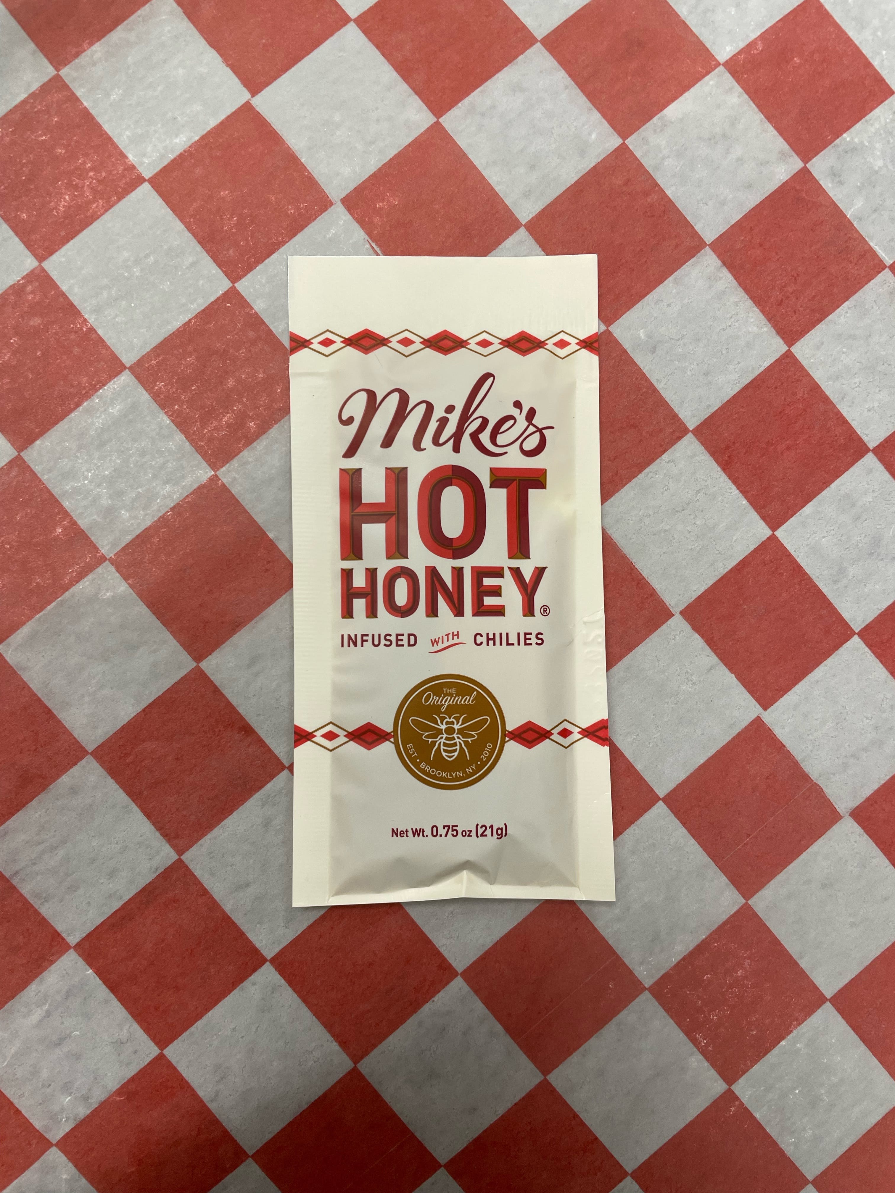 Order Mike's Hot Honey - One Packet food online from Jimmy's Pizza Litchfield store, Litchfield on bringmethat.com