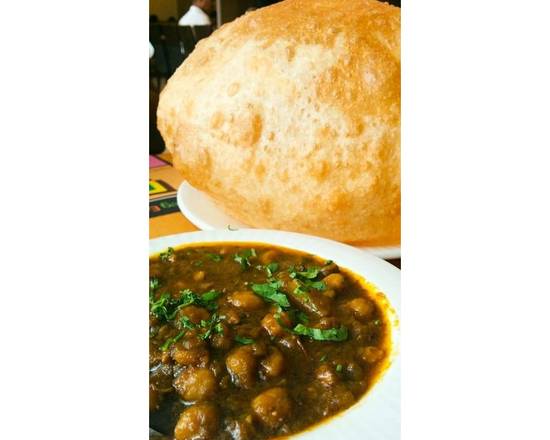 Order Cholle Bhatura food online from Baisakhi Dhaba store, Johnson City on bringmethat.com