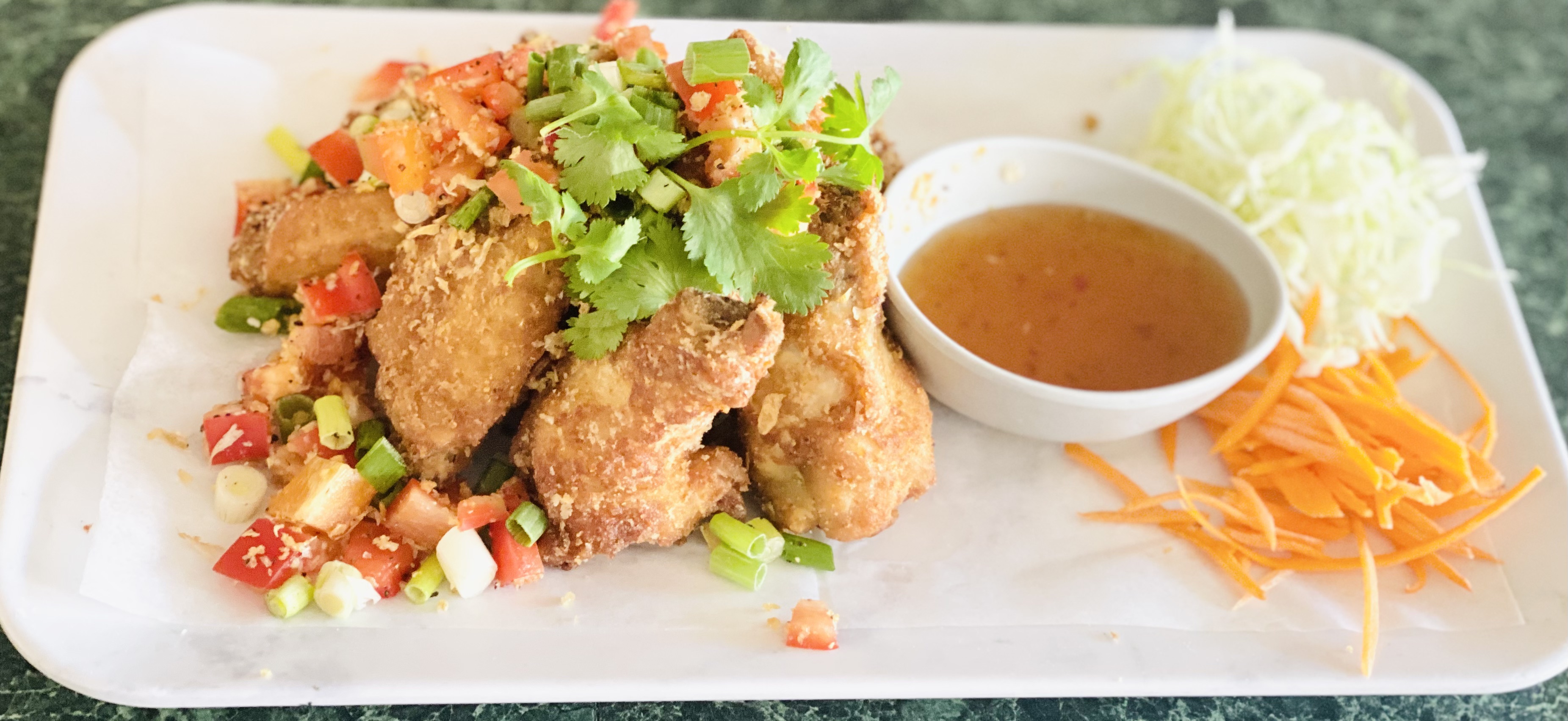Order Garlic Chicken Wings (8pcs) food online from Spices Thai kitchen store, San Diego on bringmethat.com