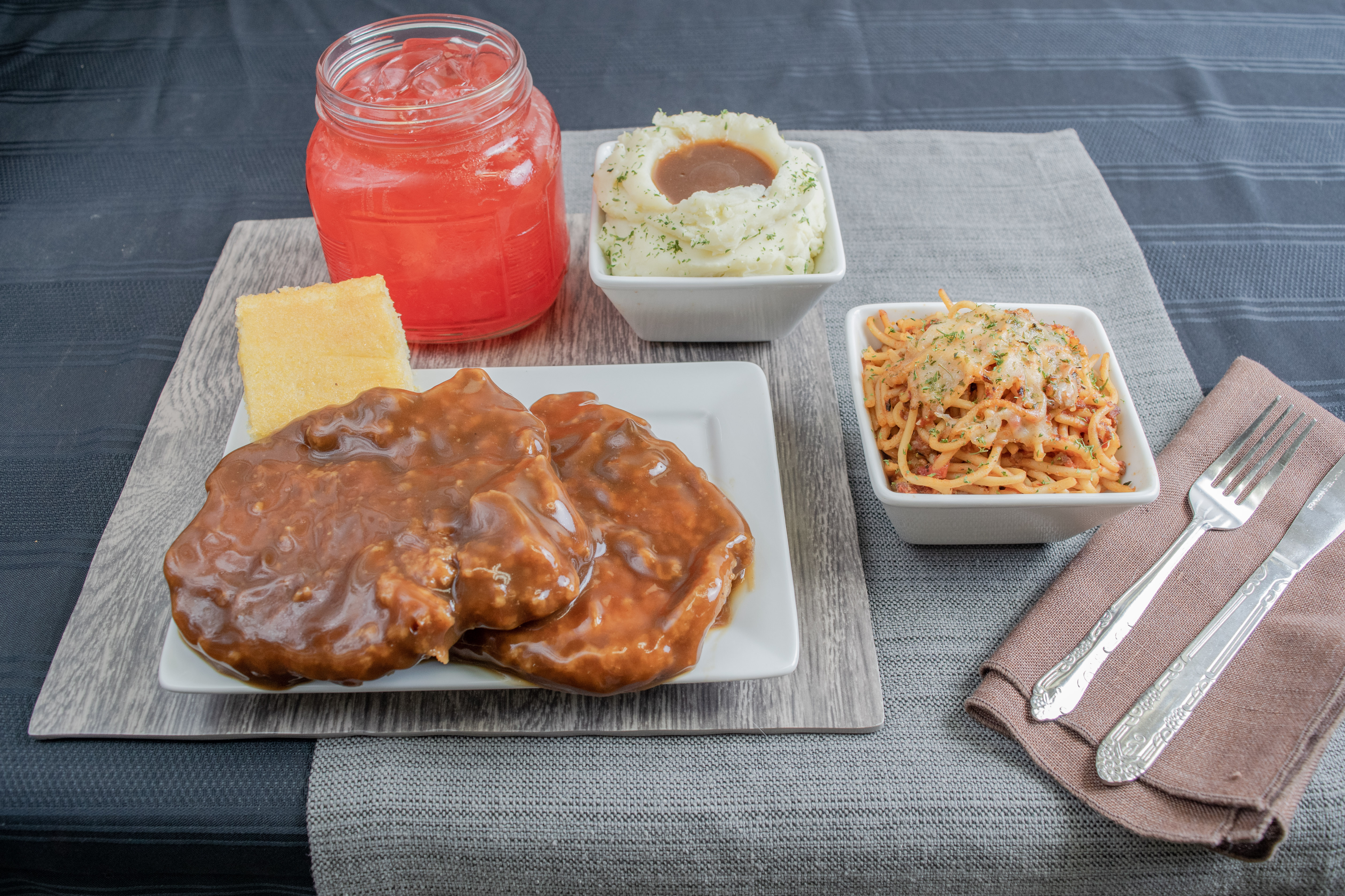 Order Smothered Pork Chop Dinner (2 pcs)  food online from Victory Soul Food store, Detroit on bringmethat.com