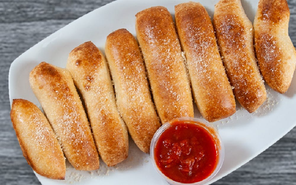 Order Homemade Breadsticks - Appetizer food online from Seasons Pizza store, Christiana on bringmethat.com