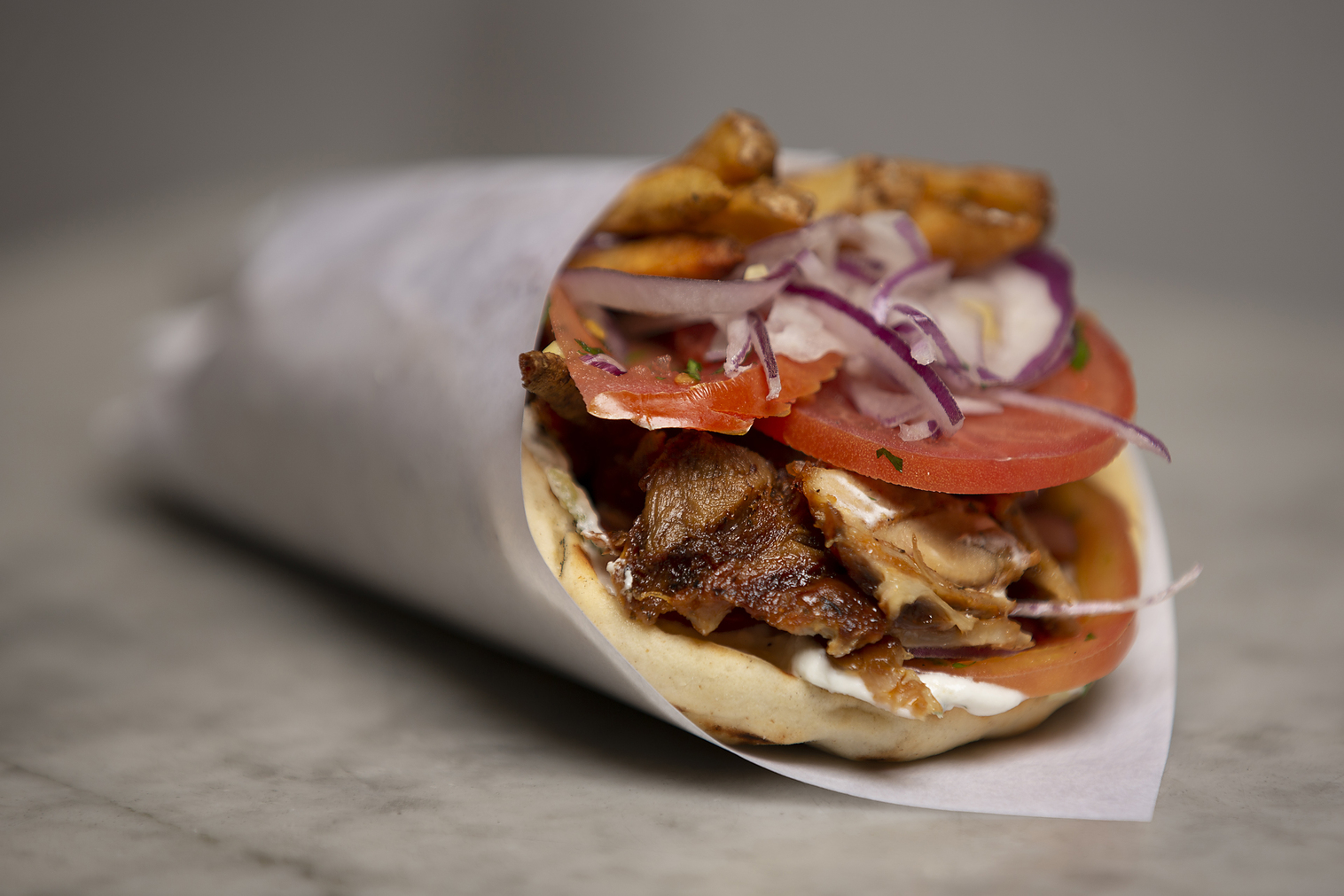Order Souvlaki Pita Sandwich food online from Greek Eats store, New York on bringmethat.com
