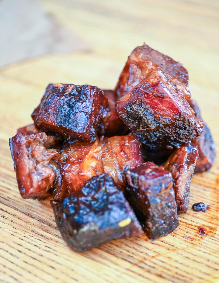 Order 1lb Pork Belly Burnt Ends food online from Blu's Barbeque & Bbq Catering store, Dallas on bringmethat.com