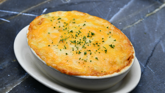 Order Smoked Gouda & Bacon Au Gratin Potatoes food online from Morton's store, Charlotte on bringmethat.com
