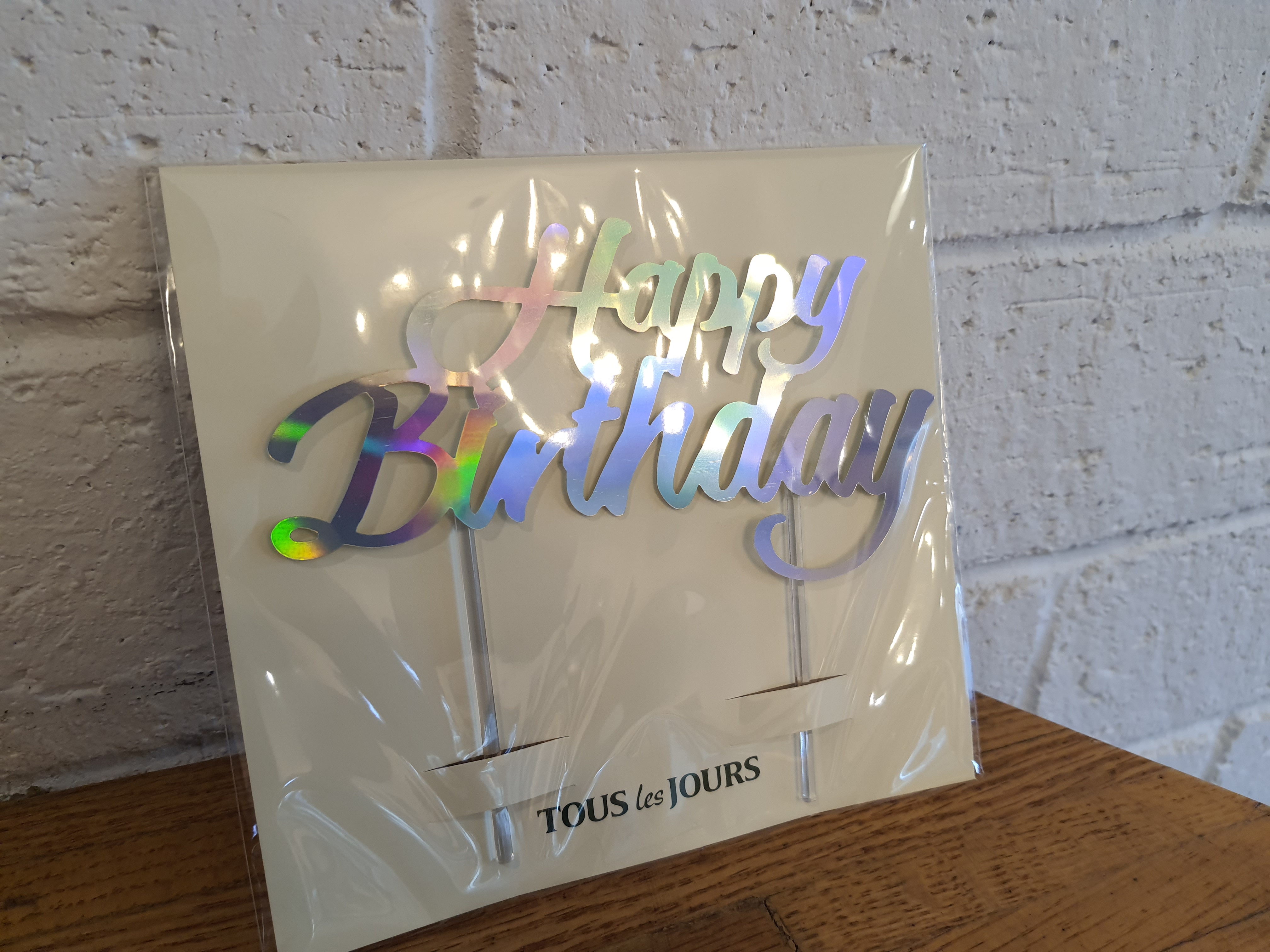 Order Happy Birthday Glossy Silver Cake Topper food online from Tous Les Jours store, Carrollton on bringmethat.com