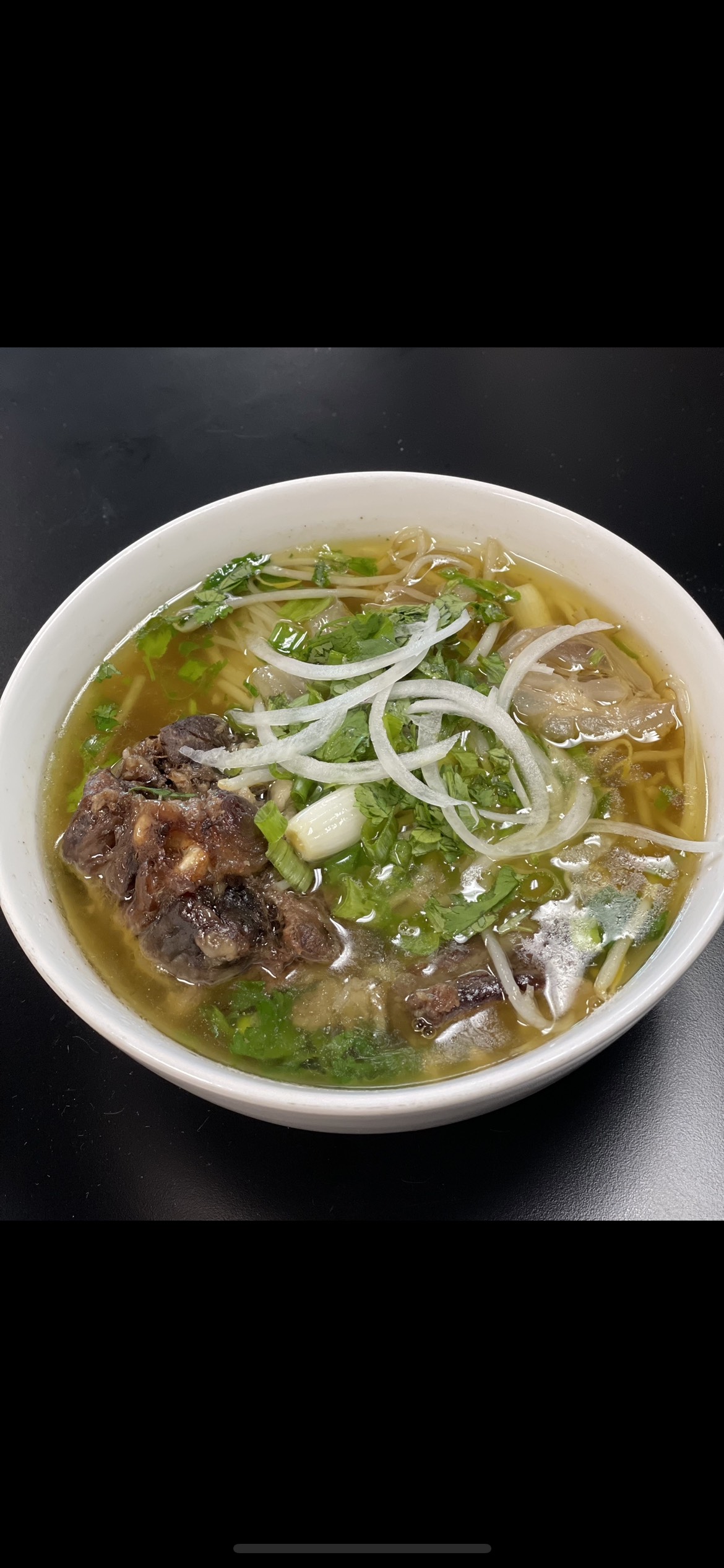 Order 21. Oxtail Pho food online from Anh Kitchen store, Hercules on bringmethat.com