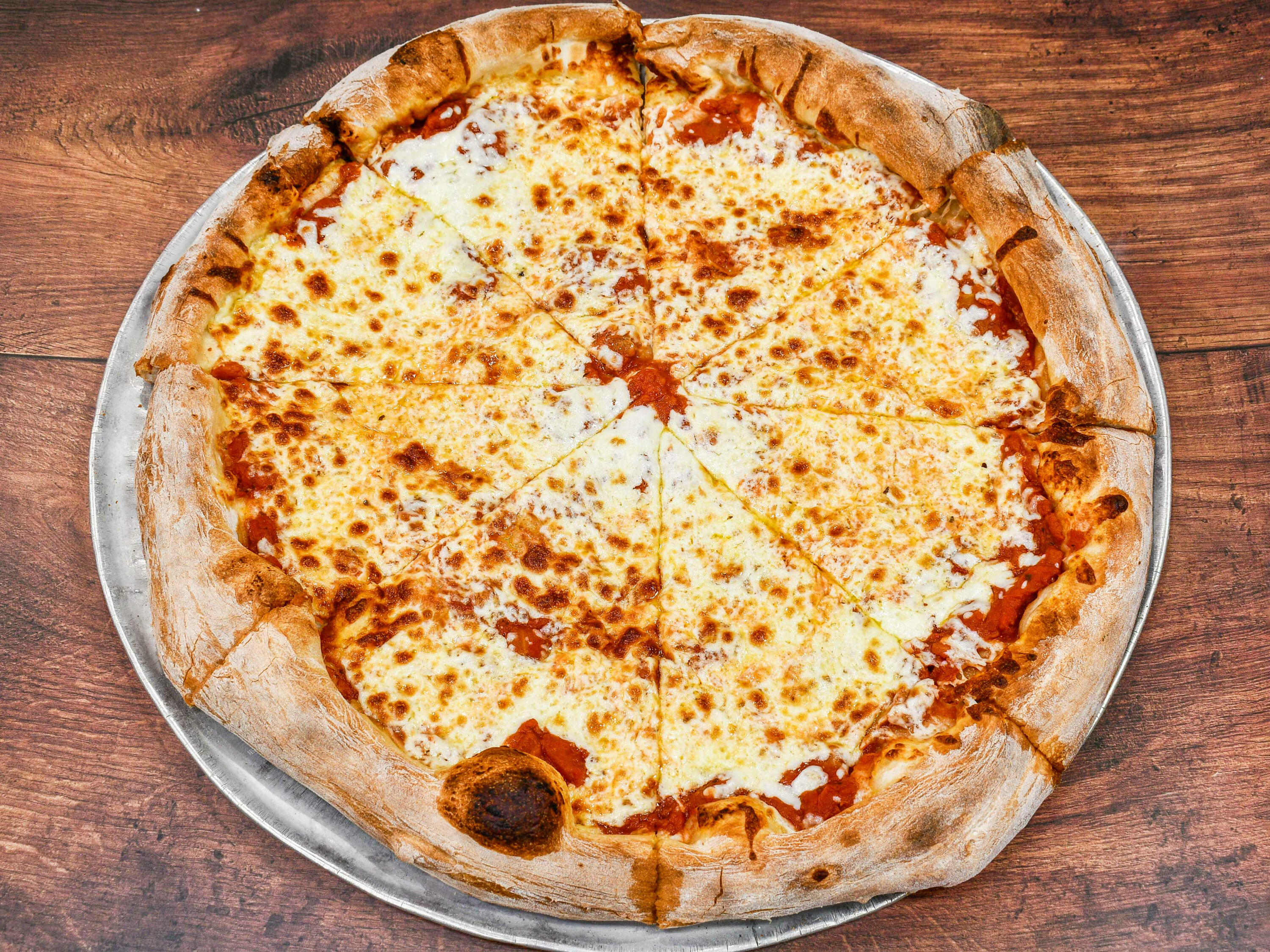 Order Simple Cheese Pizza food online from Salvatore's Restaurant store, Lawrence on bringmethat.com