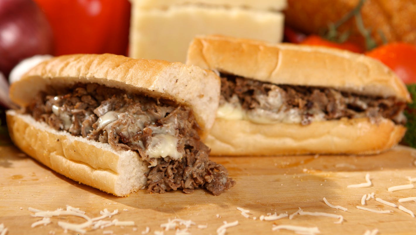 Order Cheesesteak Sub - Small food online from Golden Pizzeria store, Norfolk on bringmethat.com