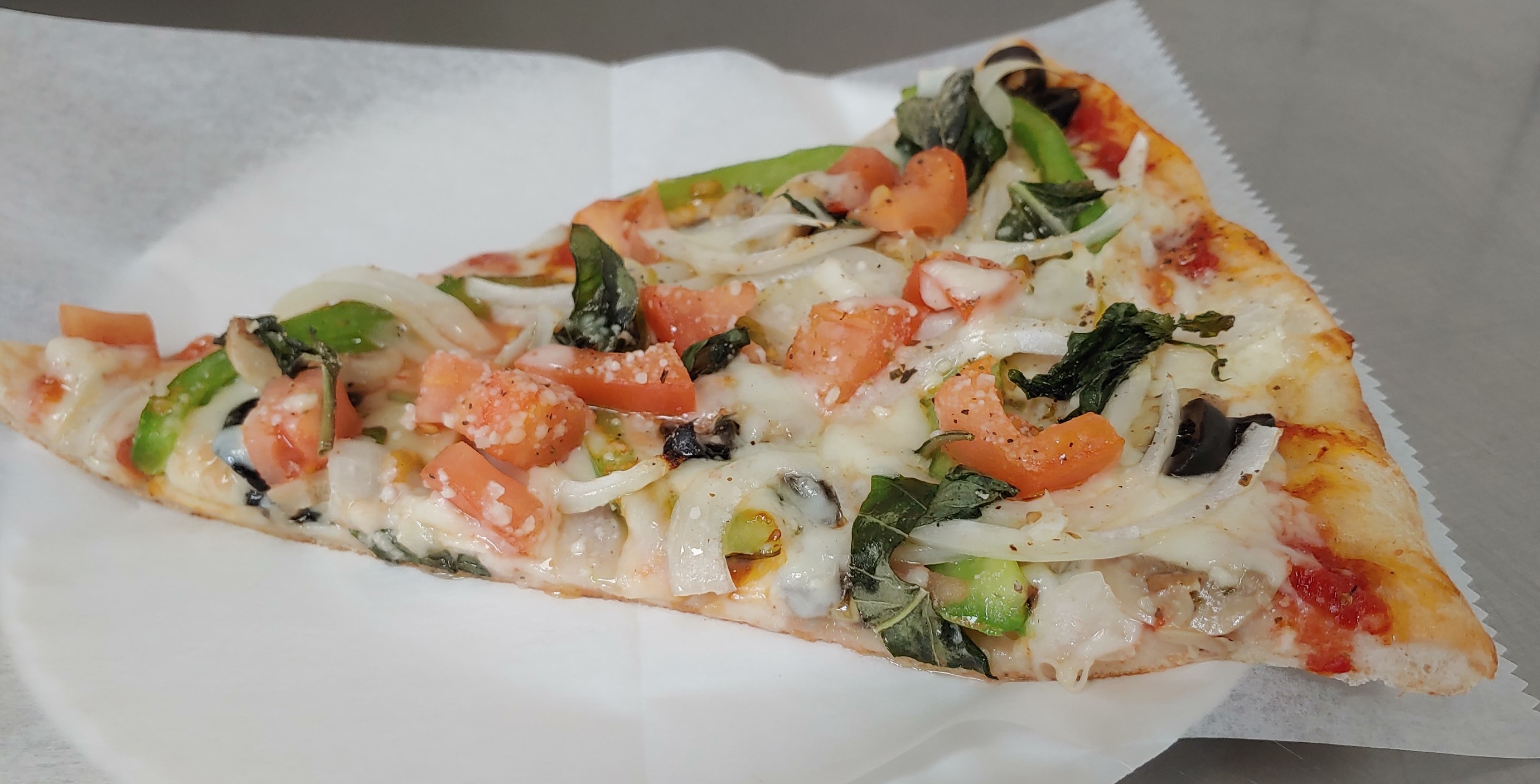 Order Vegetable Slice food online from Gino's pizzeria & restaurant catering store, Astoria on bringmethat.com