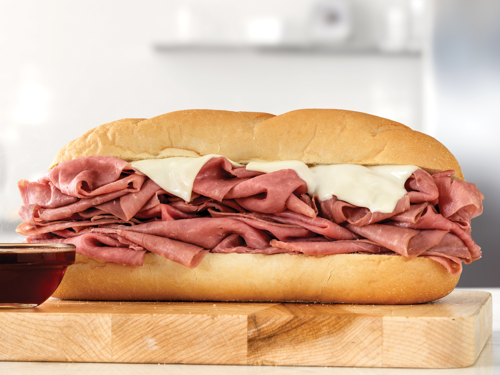 Order French Dip & Swiss 1/2 lb. with Au Jus Combo food online from Arby store, Azle on bringmethat.com