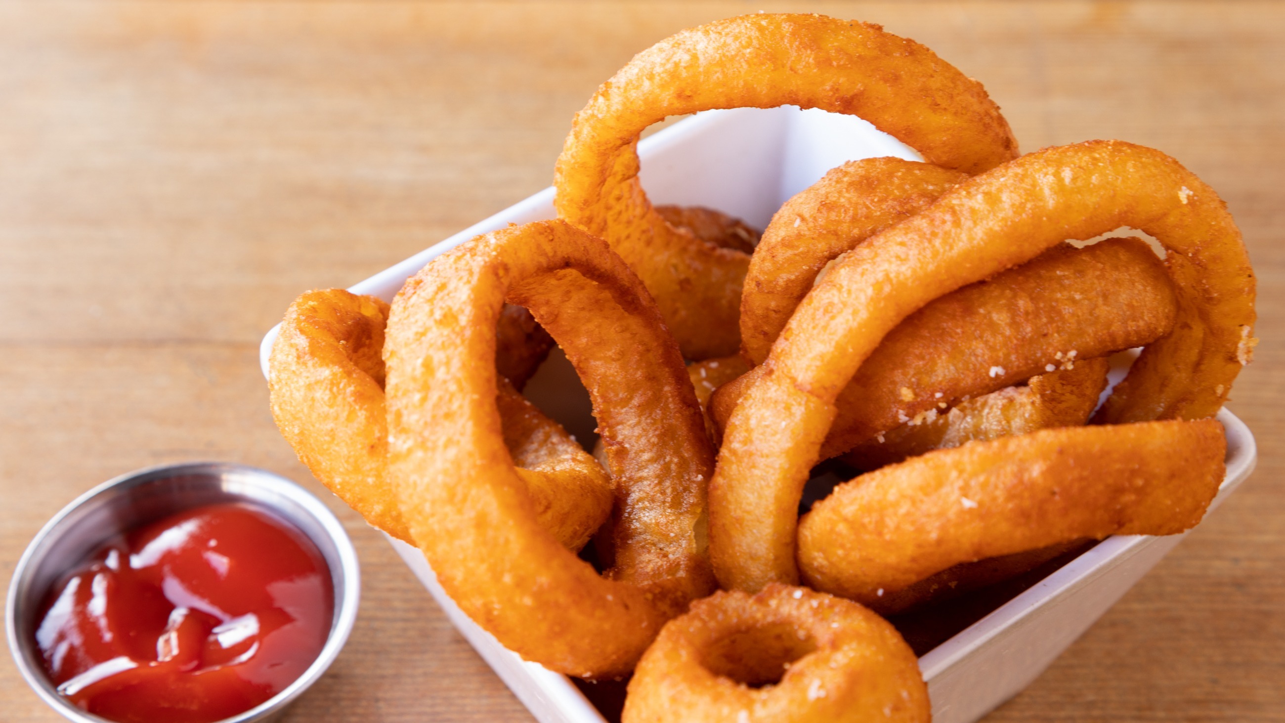 Order Beer Battered Onion Rings food online from Stout Burger store, Palm Springs on bringmethat.com