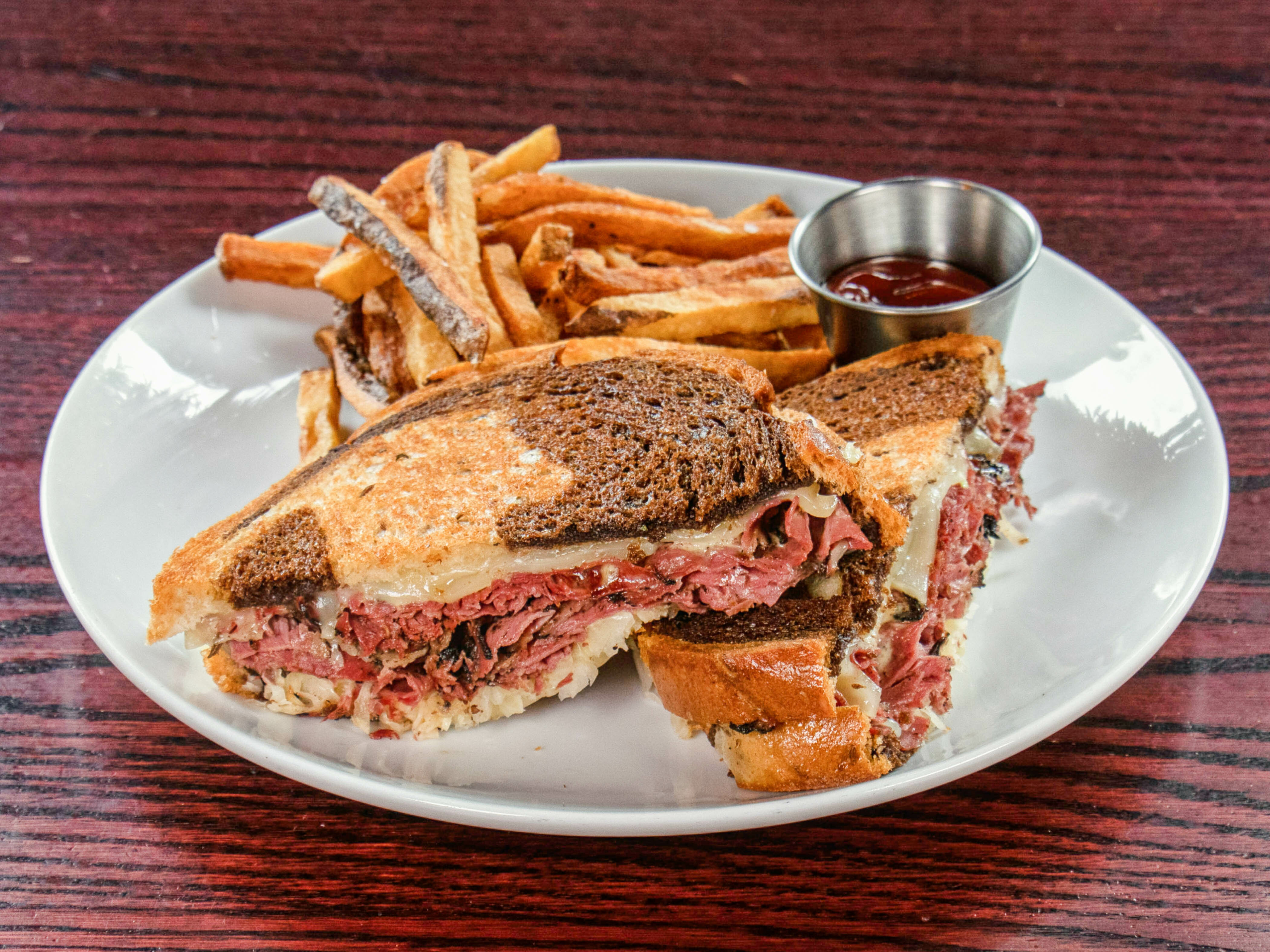 Order Corned Beef Reuben Sandwich food online from The Bungalow Alehouse store, Ashburn on bringmethat.com