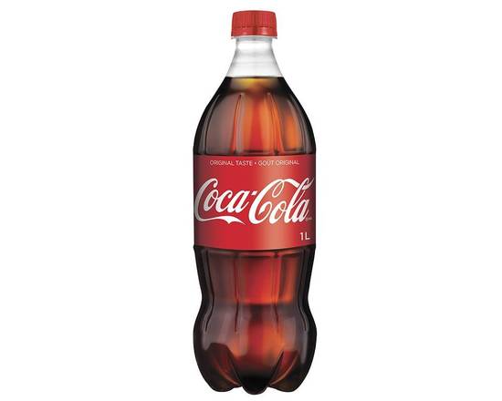 Order Coca Cola, 2L mixer food online from Babaro Liquor Store store, Peabody on bringmethat.com