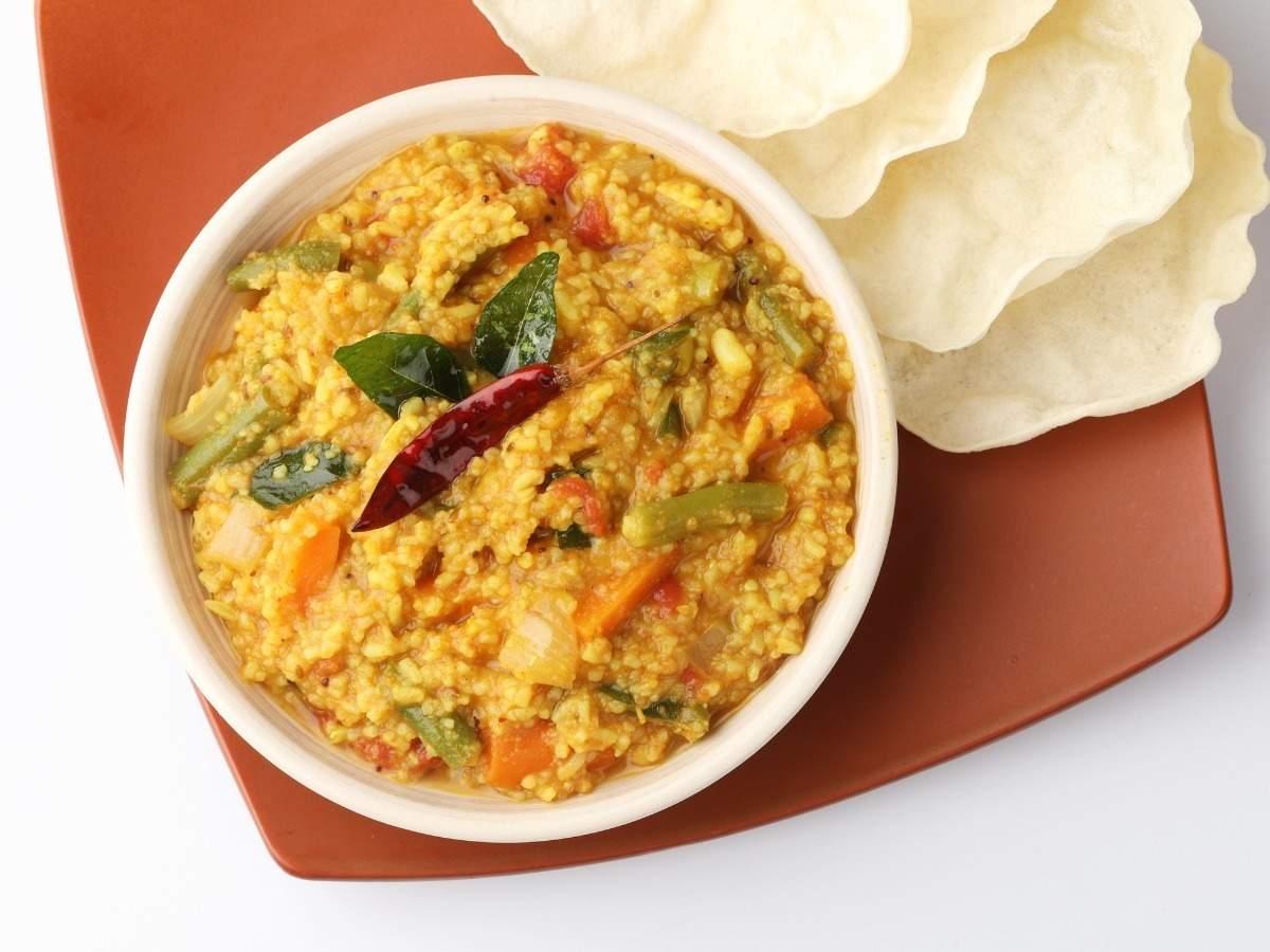 Order Sambar Rice food online from Madras Cafe store, San Diego on bringmethat.com