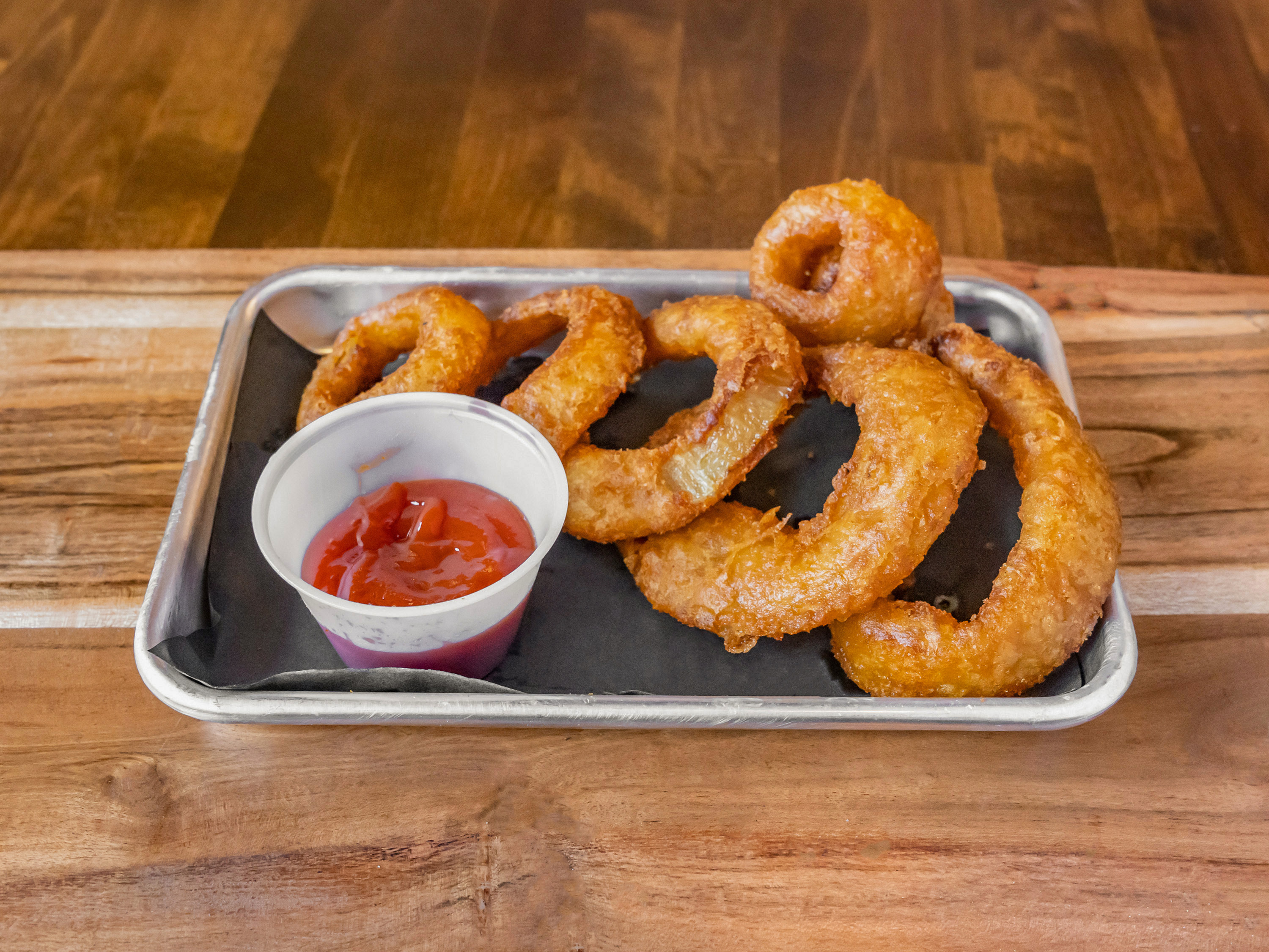 Order Onion Rings food online from Empire Bagel store, Cross River on bringmethat.com