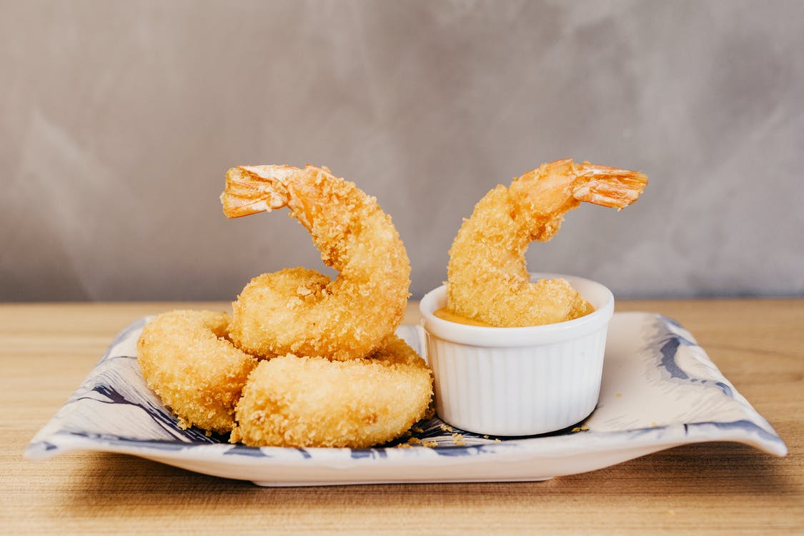 Order A4. Fried Fish food online from New Peter Kitchen store, Flushing on bringmethat.com