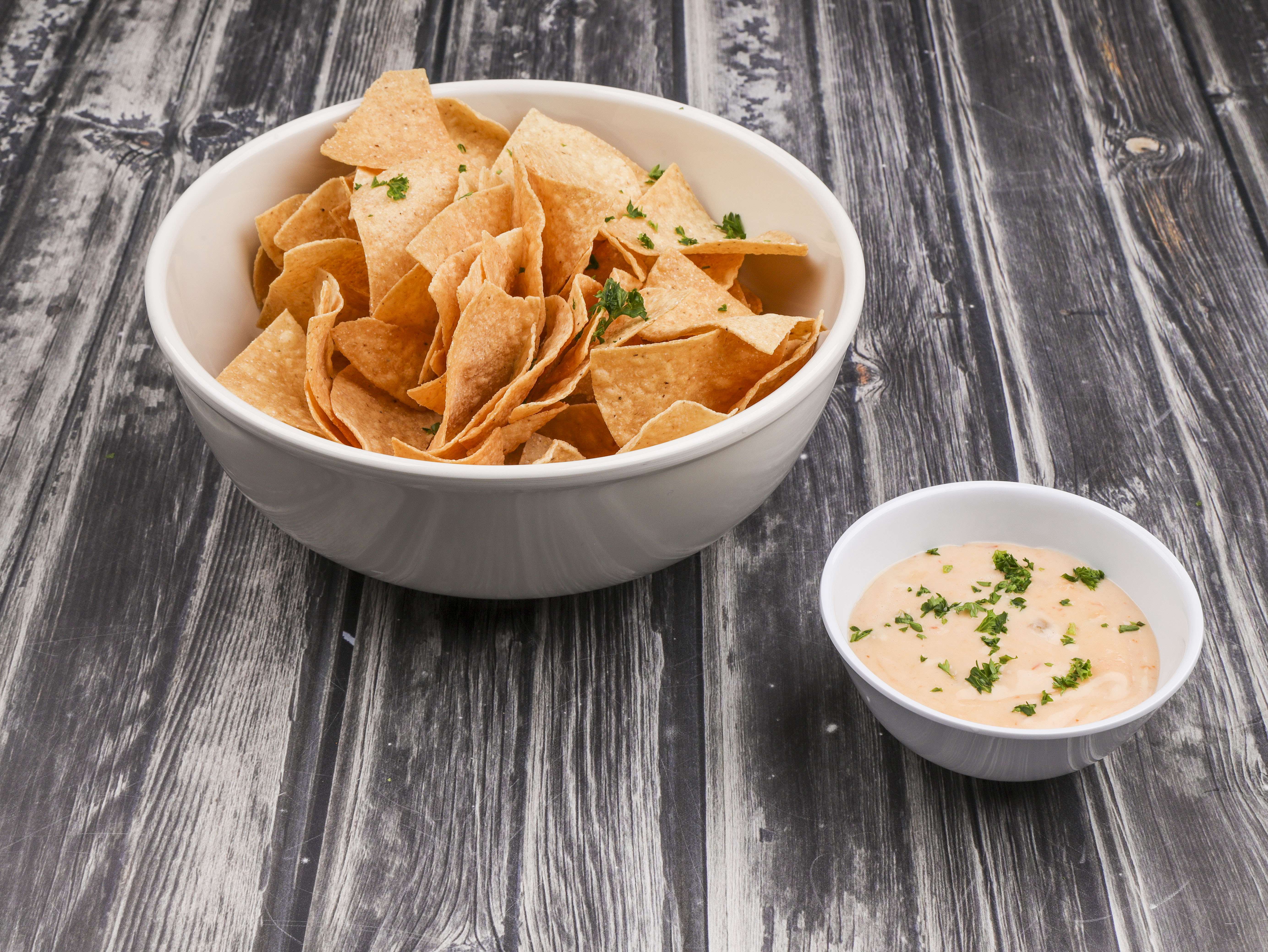 Order Salsa con Queso Dip food online from Campus Bar and Grill store, Columbia on bringmethat.com