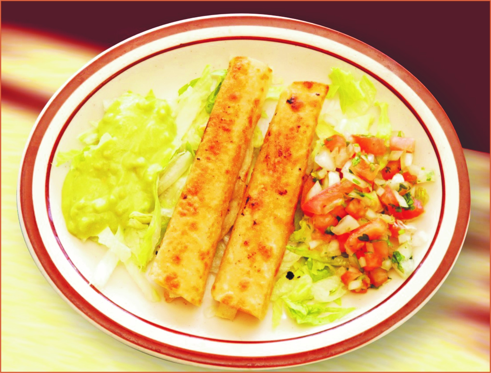 Order 2 Taquitos with Guacamole a La Carte food online from Mi Zacatecas Mexican Food store, Hawthorne on bringmethat.com