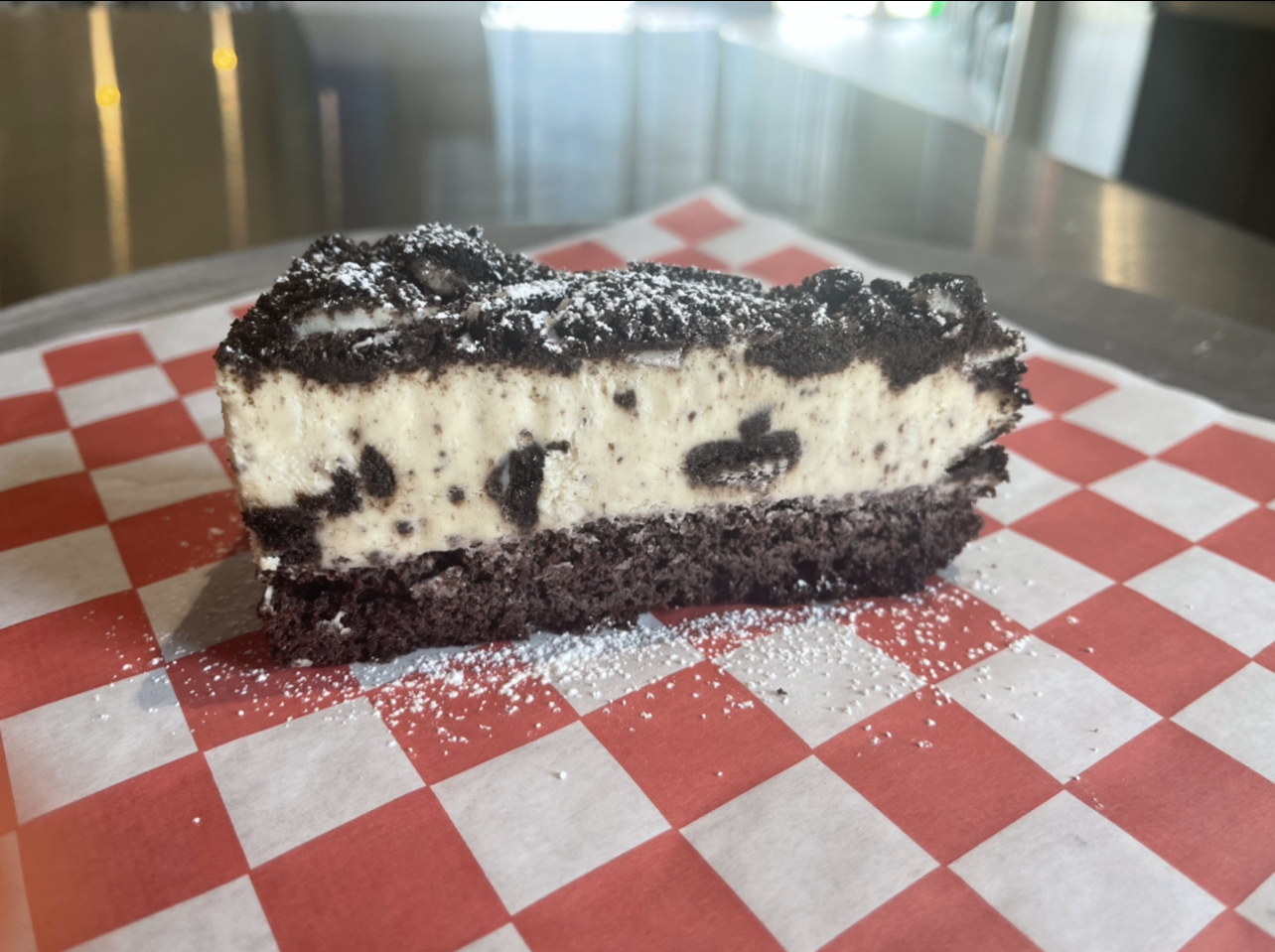Order Oreo Mousse Cake food online from Johnny's Pizza store, Cary on bringmethat.com