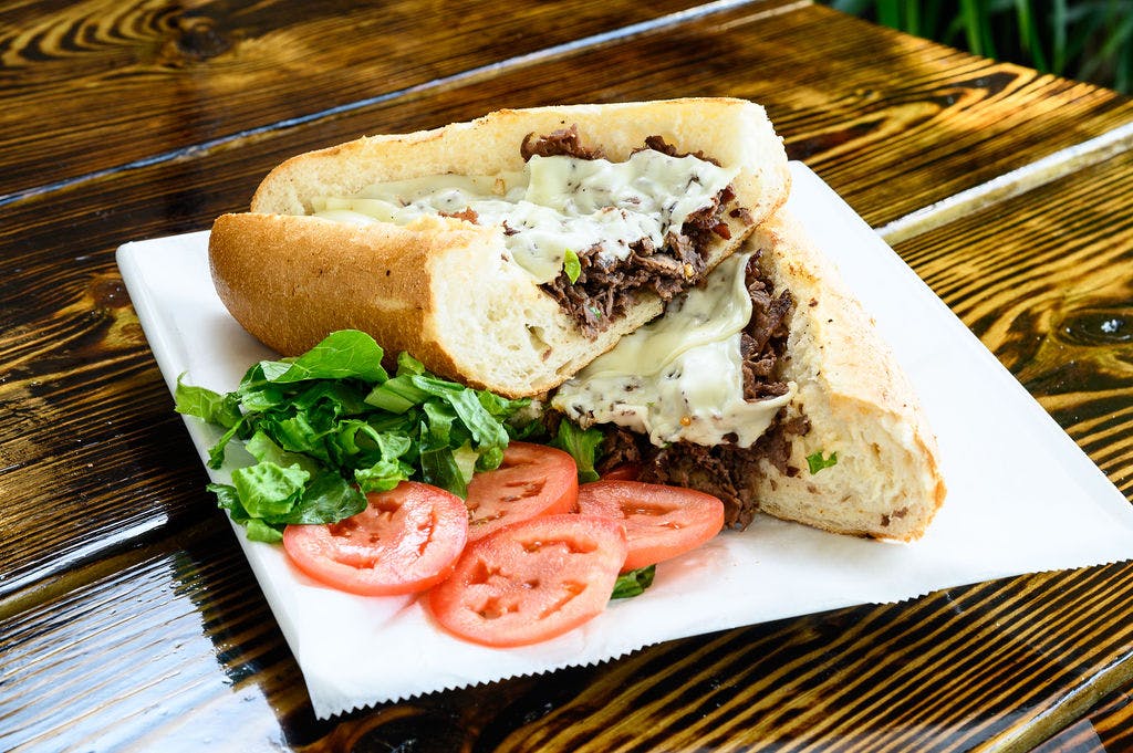 Order Philly Cheesesteak Sandwich - Sandwich food online from Flamez wood fired pizza store, Blackwood on bringmethat.com