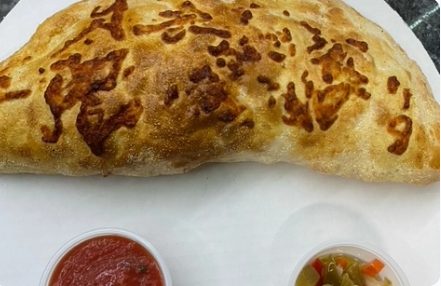 Order Calzone Ripieno food online from Roma Cafe store, Worth on bringmethat.com
