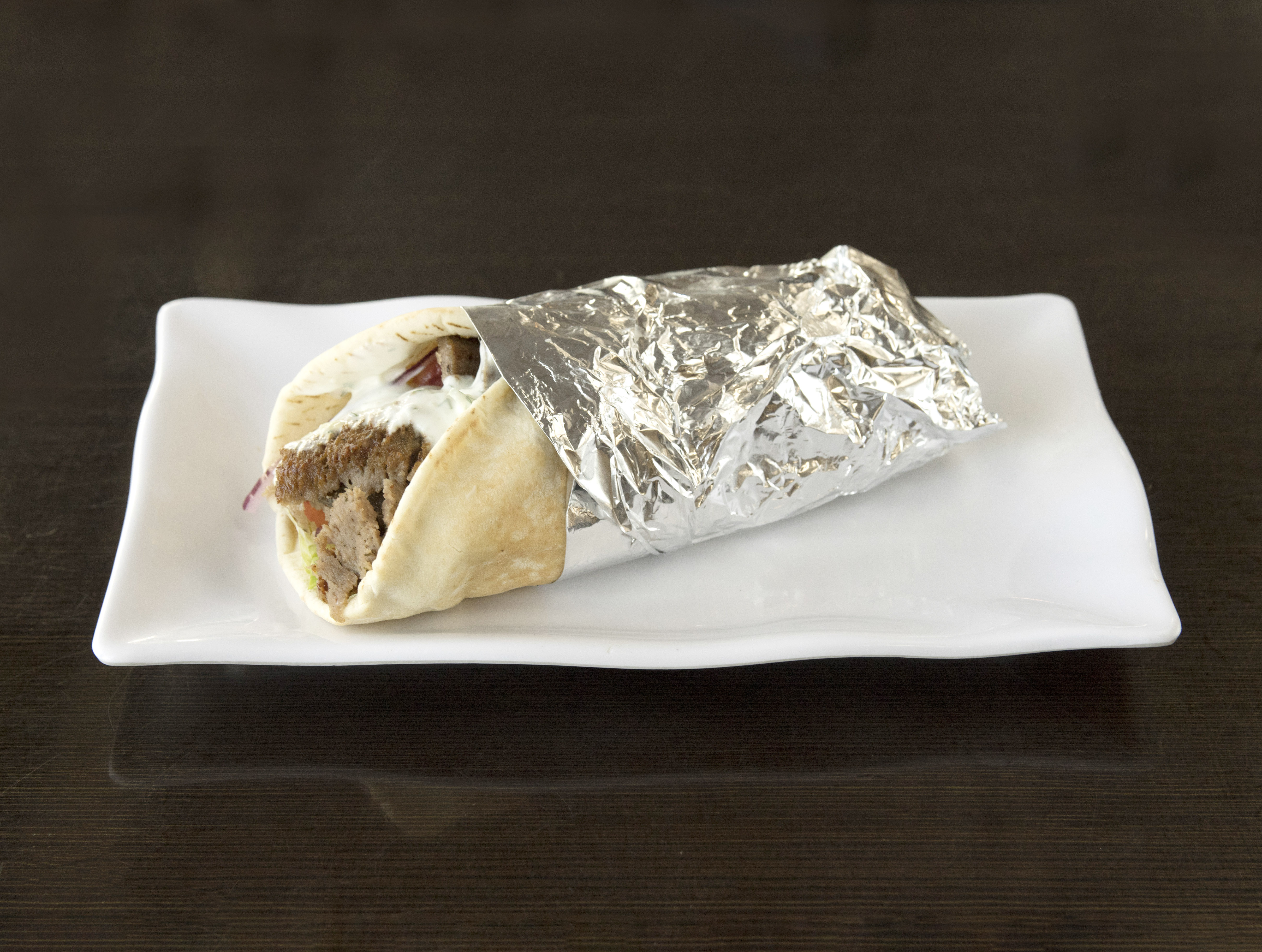 Order Gyro Sandwich In Pita food online from North Park Produce Bakery & Grill store, Poway on bringmethat.com
