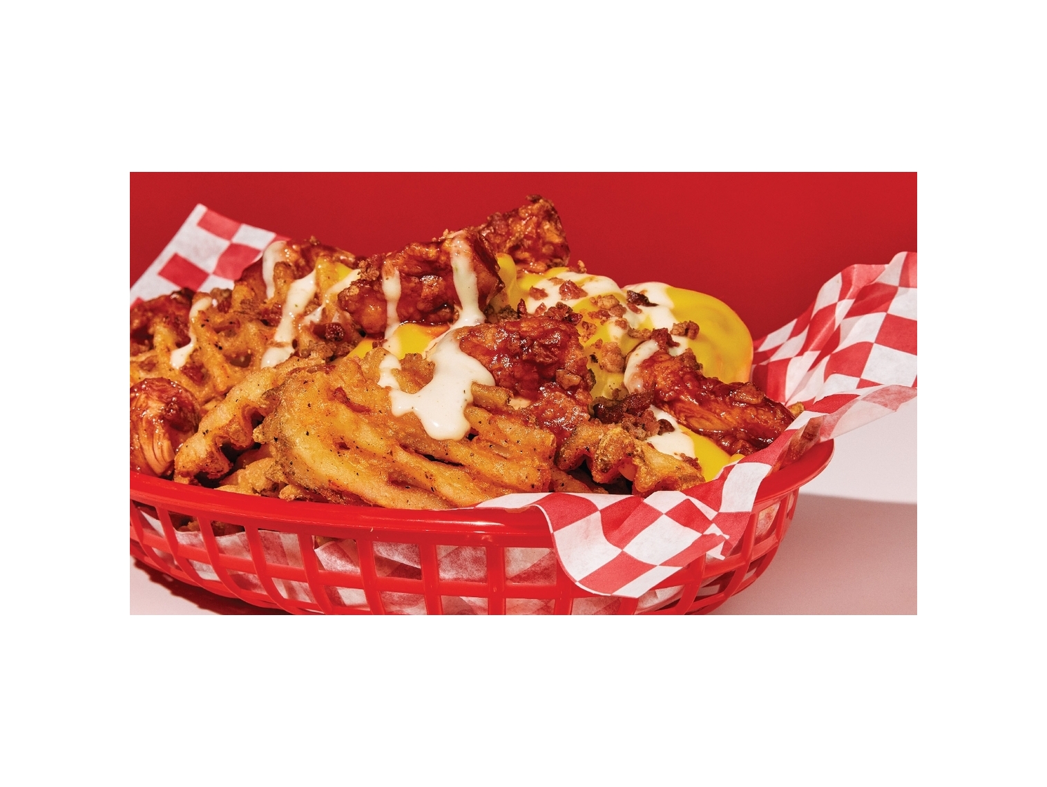 Order Cheesy Chicken Loaded Nachos: Waffle Fries food online from Wings Over store, Greenville on bringmethat.com