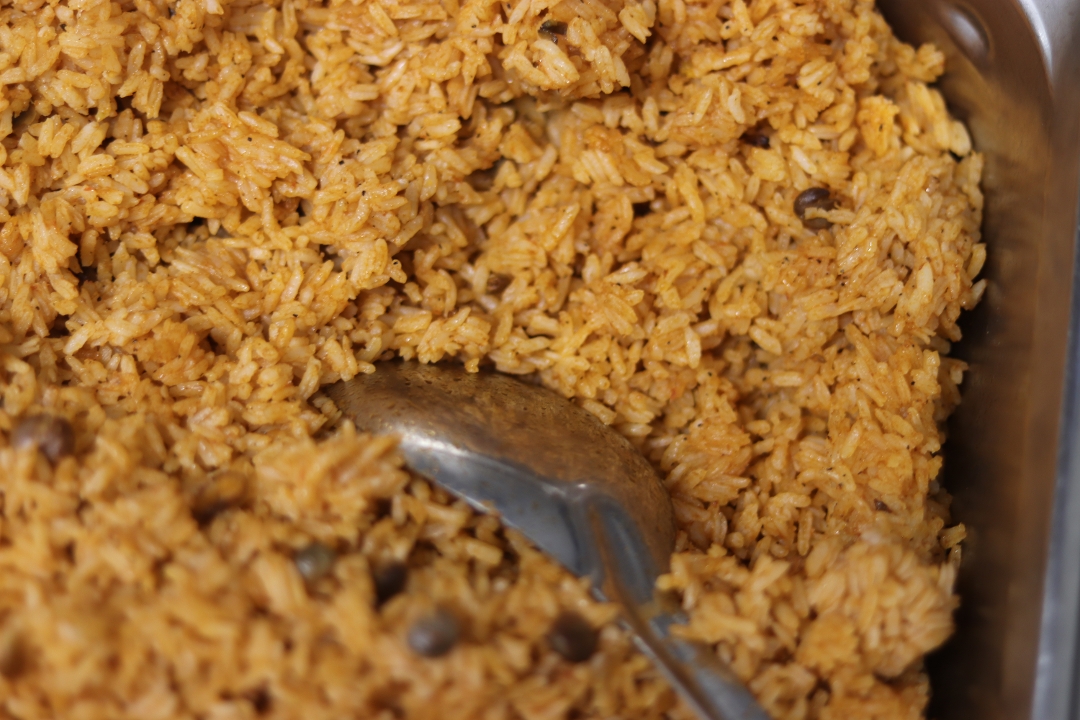 Order Moro - yellow Rice pequeno food online from Don Quijote Restaurant store, Manchester on bringmethat.com