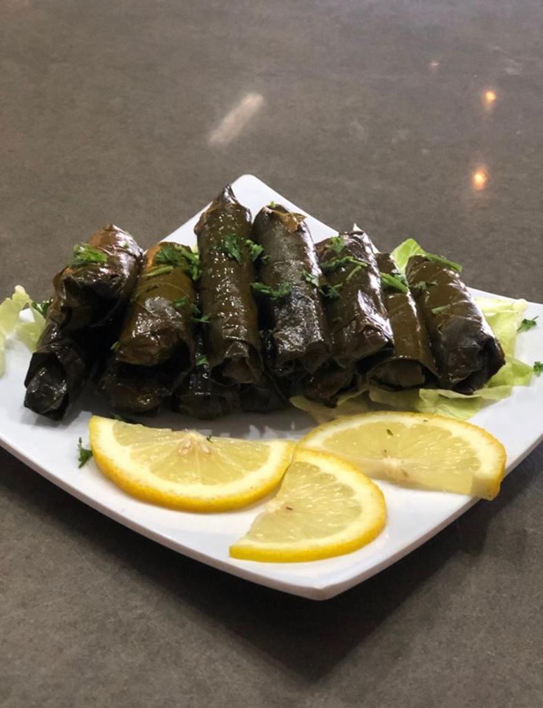 Order 6 Piece Grape Leaves food online from Fattoush Mediterranean Grill store, Akron on bringmethat.com