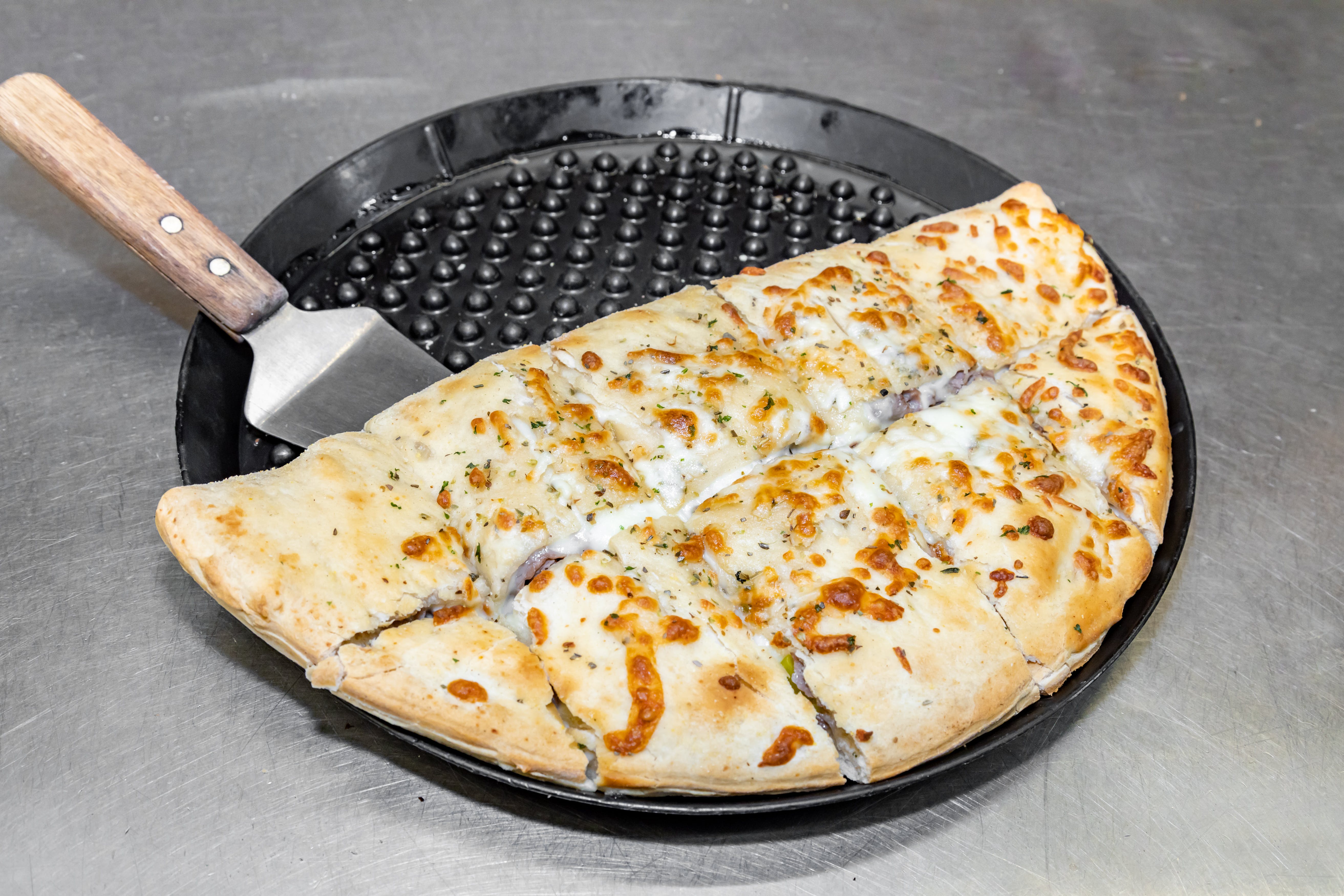 Order Calzone - Calzone food online from Luconi's Pizza store, Bradley on bringmethat.com