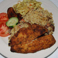 Order Cook-Up Rice with Fried Tailapia(1pc) food online from Taste of the Caribbean store, Capitol Heights on bringmethat.com