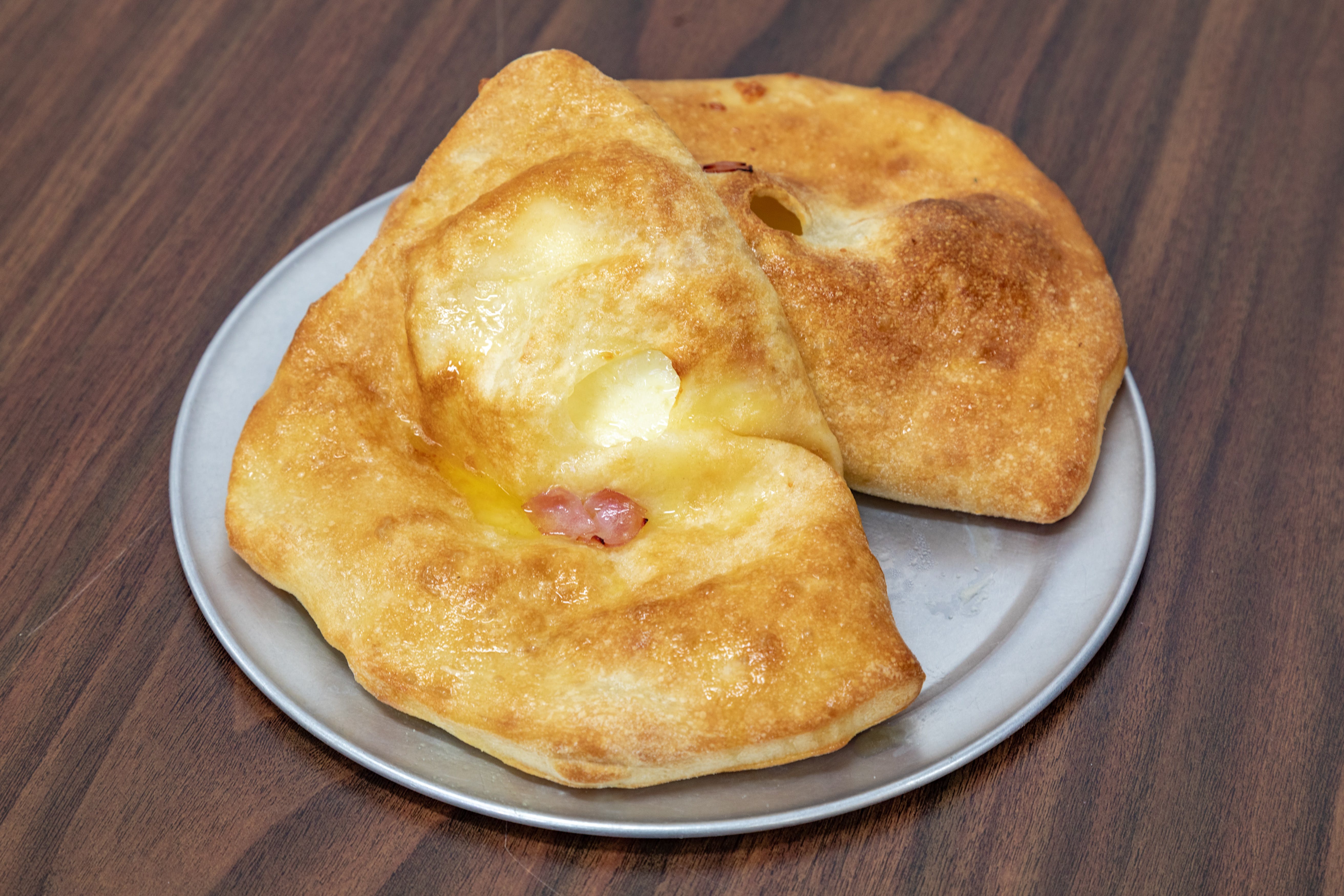 Order Ham & Cheese Calzone - Calzone food online from Pronta Pizzeria store, Indianapolis on bringmethat.com