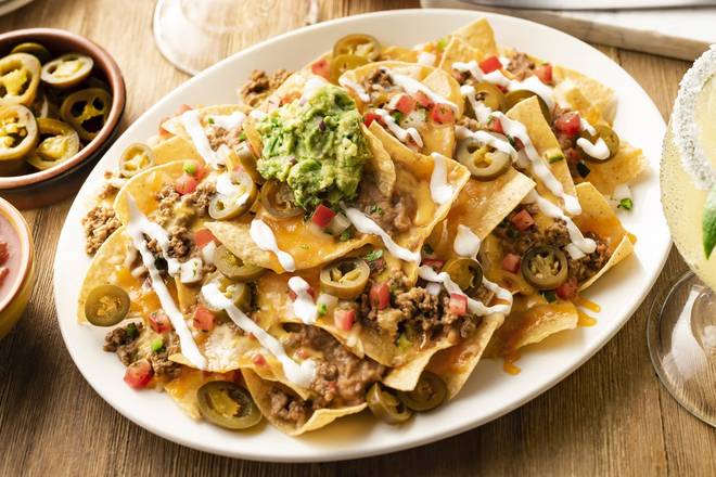 Order Stacked Nachos food online from On The Border store, Holland on bringmethat.com