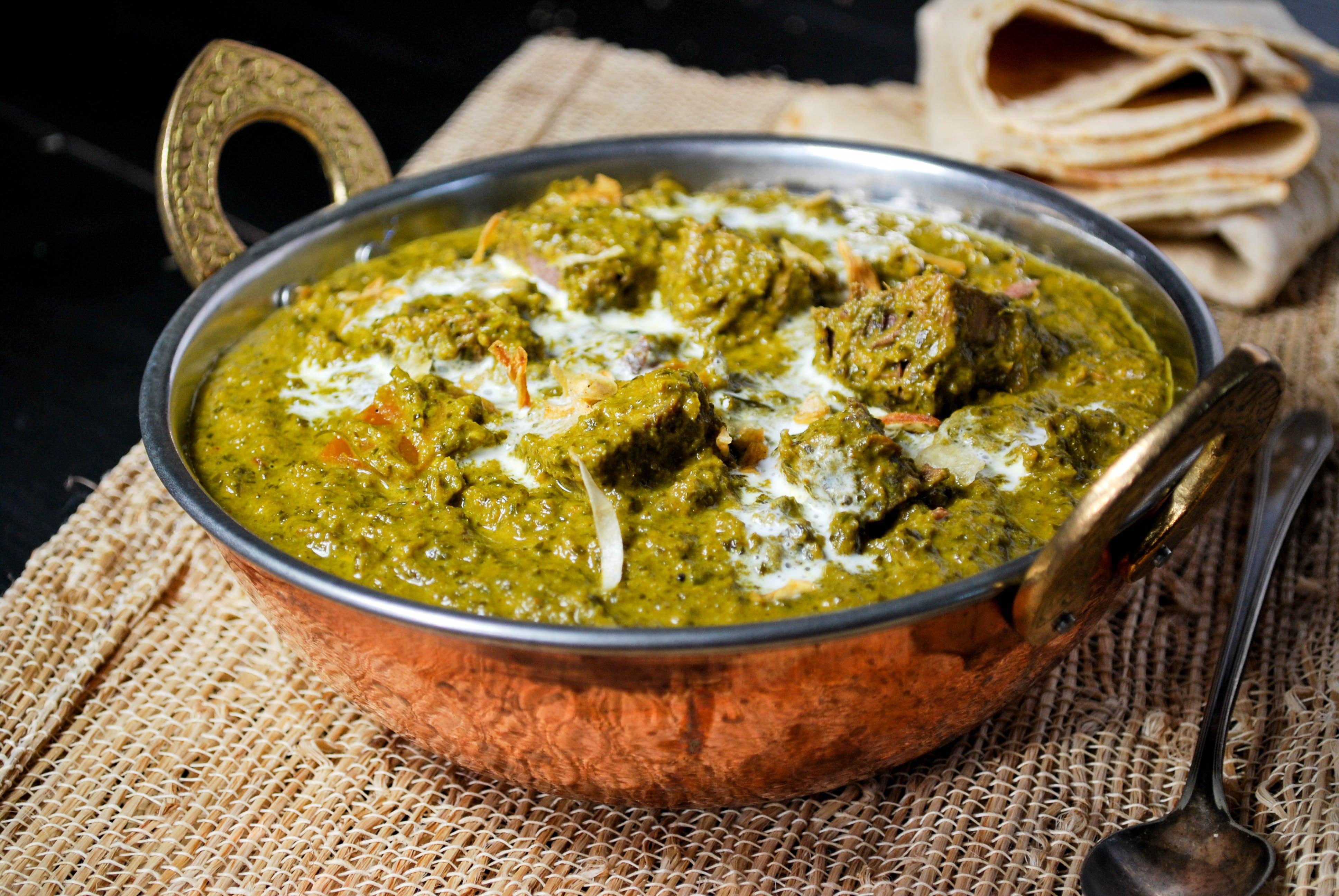 Order LAMB SAAG food online from Thumka Indian Express store, Algonquin on bringmethat.com