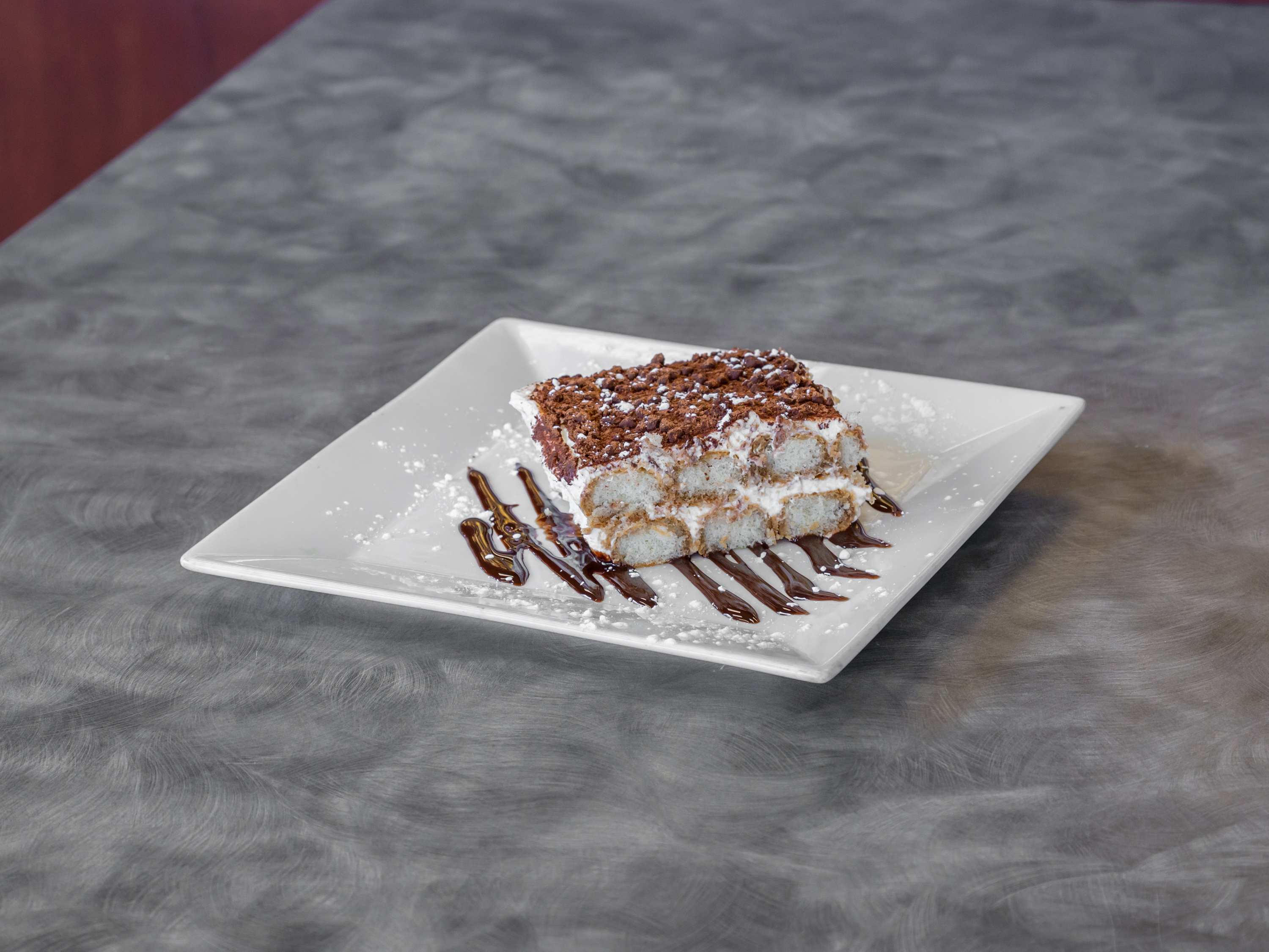 Order HOMEMADE Tiramisu food online from Enzo Pizza store, Indianapolis on bringmethat.com