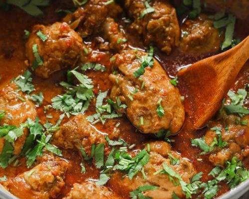 Order Bombay Chicken Curry food online from Bombay Kitchen store, Tucker on bringmethat.com